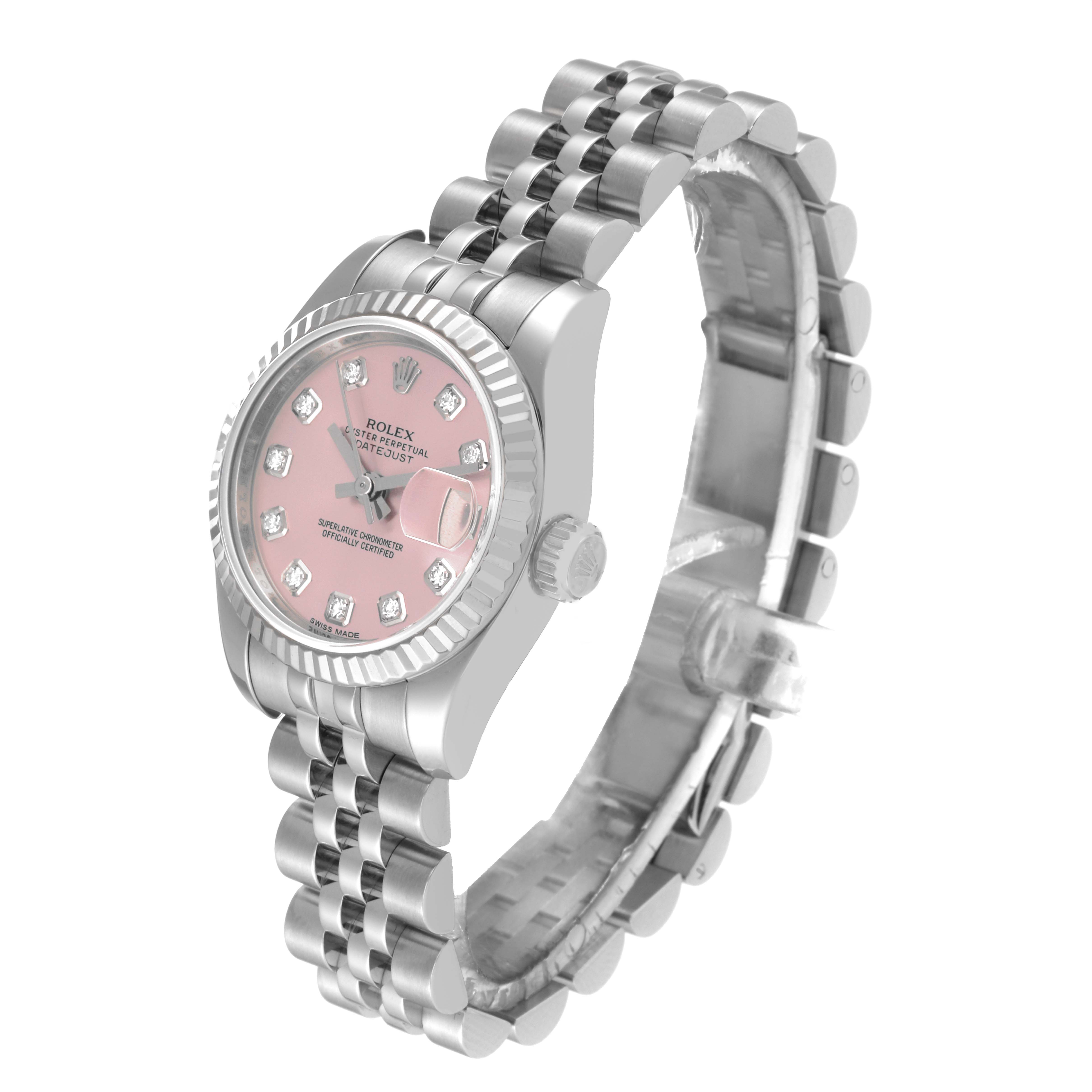 The Rolex Datejust 179174 Women's Stainless Steel Pink Dial 179174 Women's Stainless Steel Pink Dial watch is shown at an angled side view, displaying the dial, bezel, crown, and bracelet.