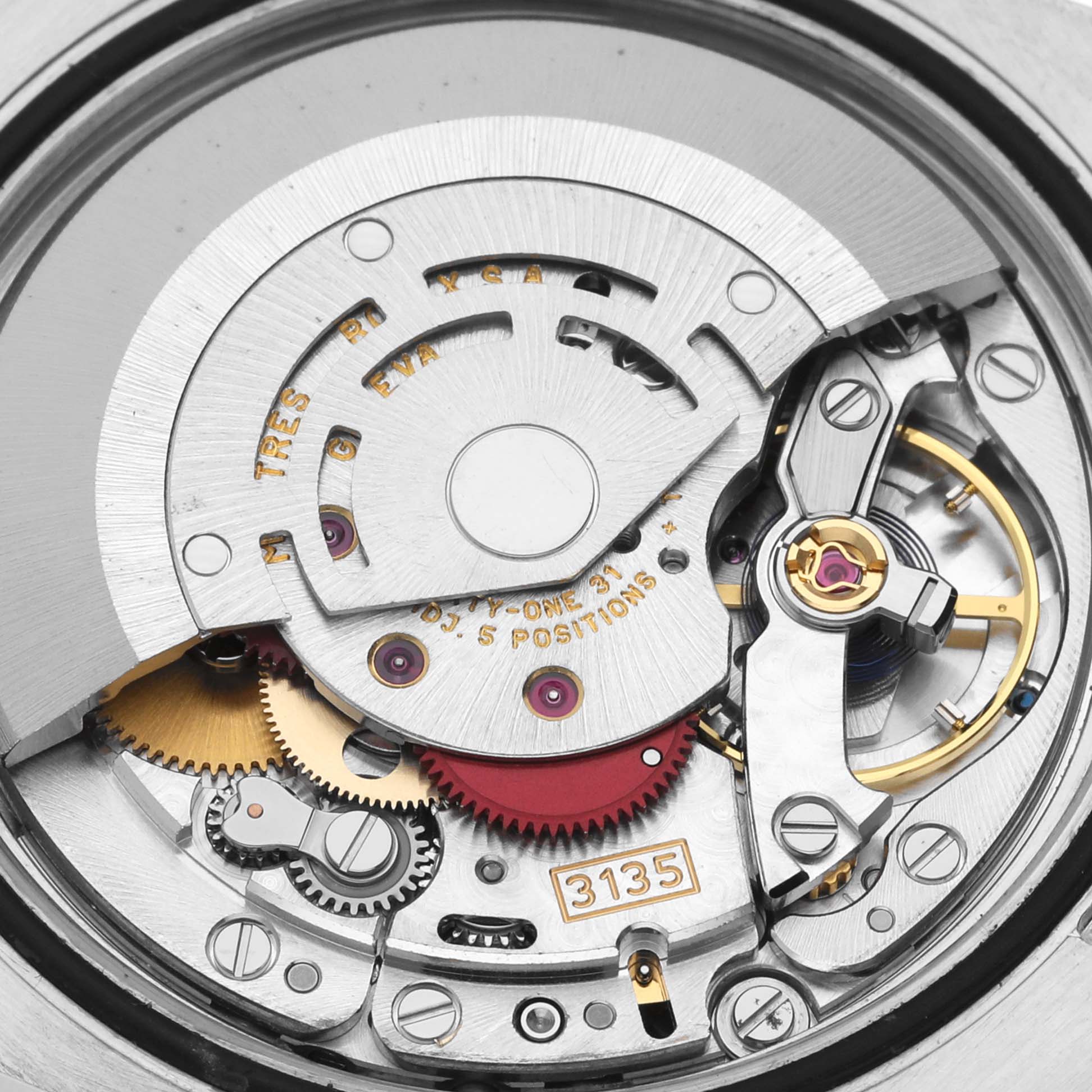This image shows a close-up view of the movement mechanism of a Rolex Datejust 116234 Men's Stainless Steel Silver Dial 116234 Men's Stainless Steel Silver Dial watch, highlighting the gears and rotor.