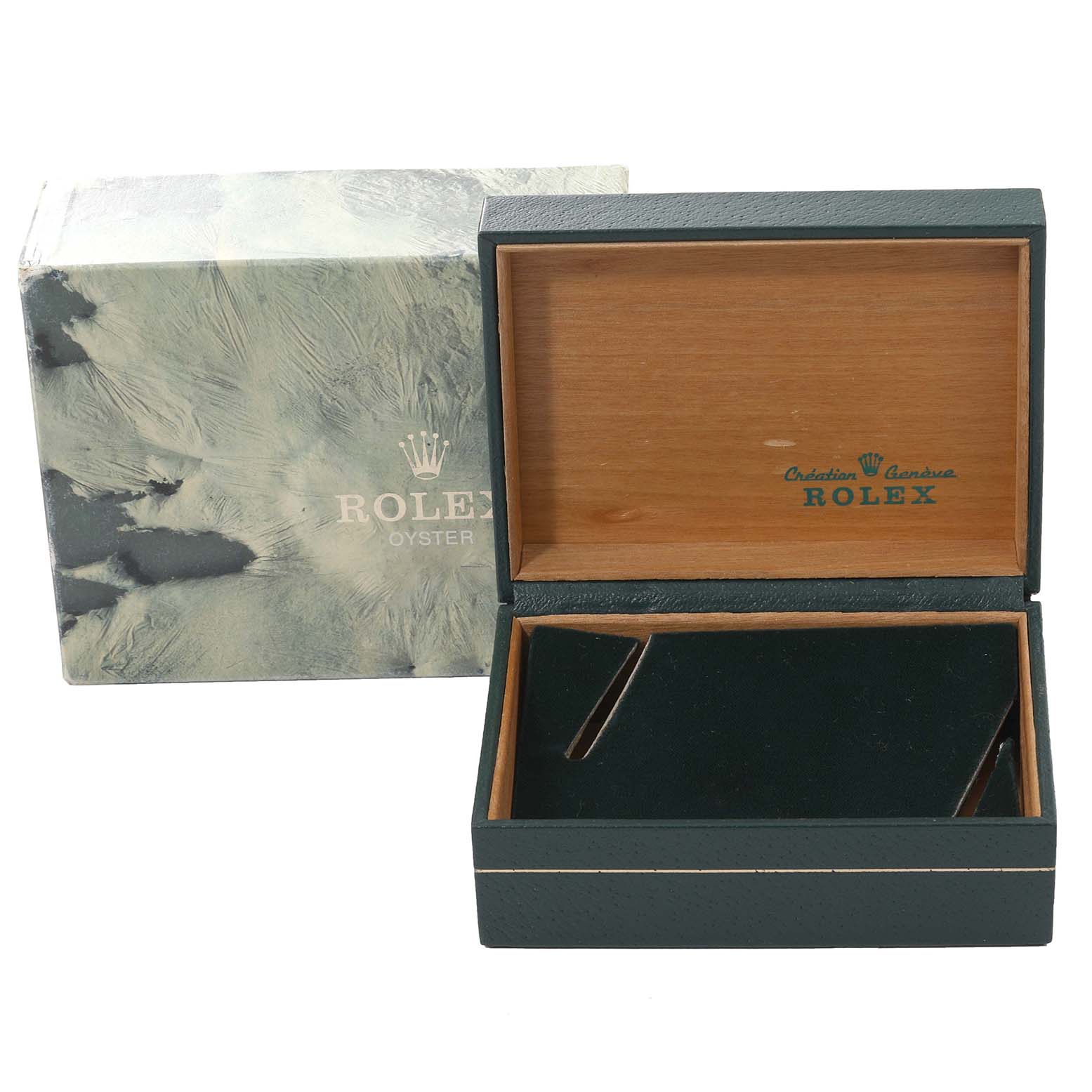 The image shows an open Rolex box for the Datejust model with the outer packaging in the background.