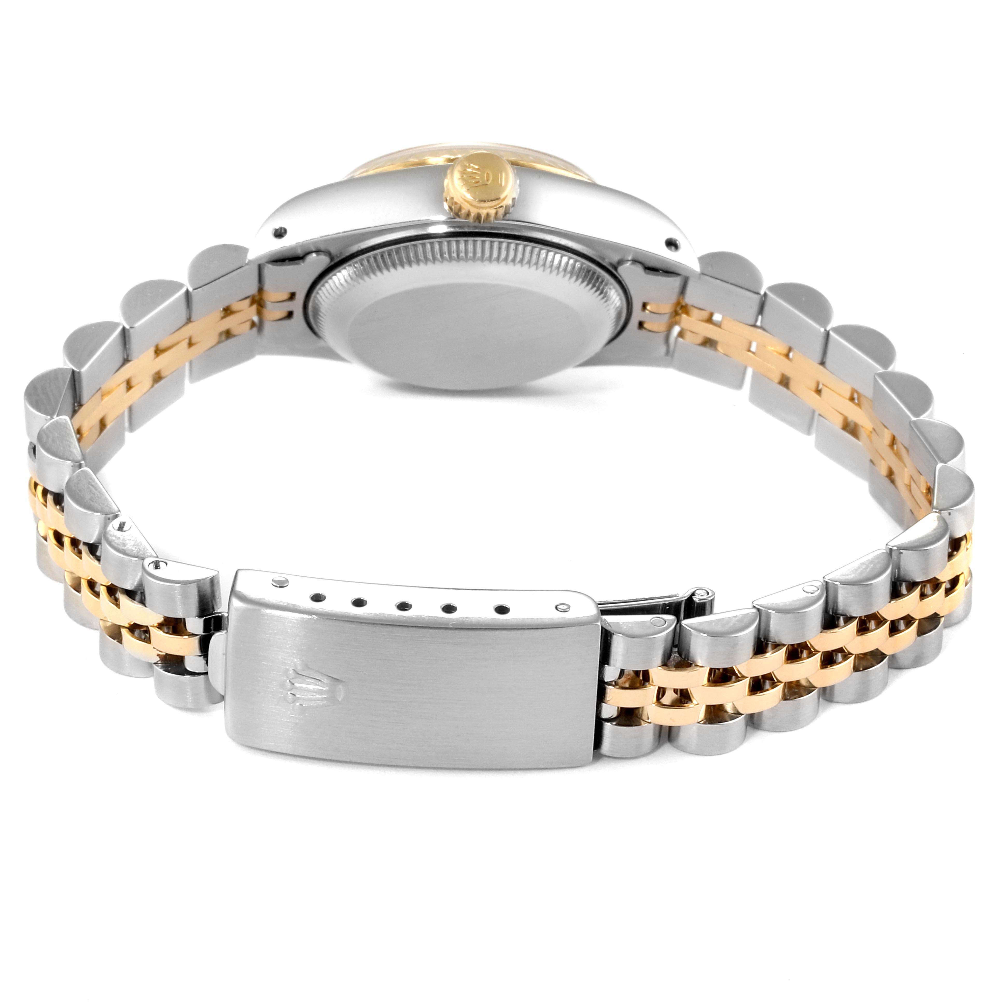 This image shows the back of the Rolex Datejust 69173 Women
s Steel and Gold (two tone) Black Dial 69173 Women
s Steel and Gold (two tone) Black Dial watch, highlighting the clasp, case back, and two-tone bracelet.