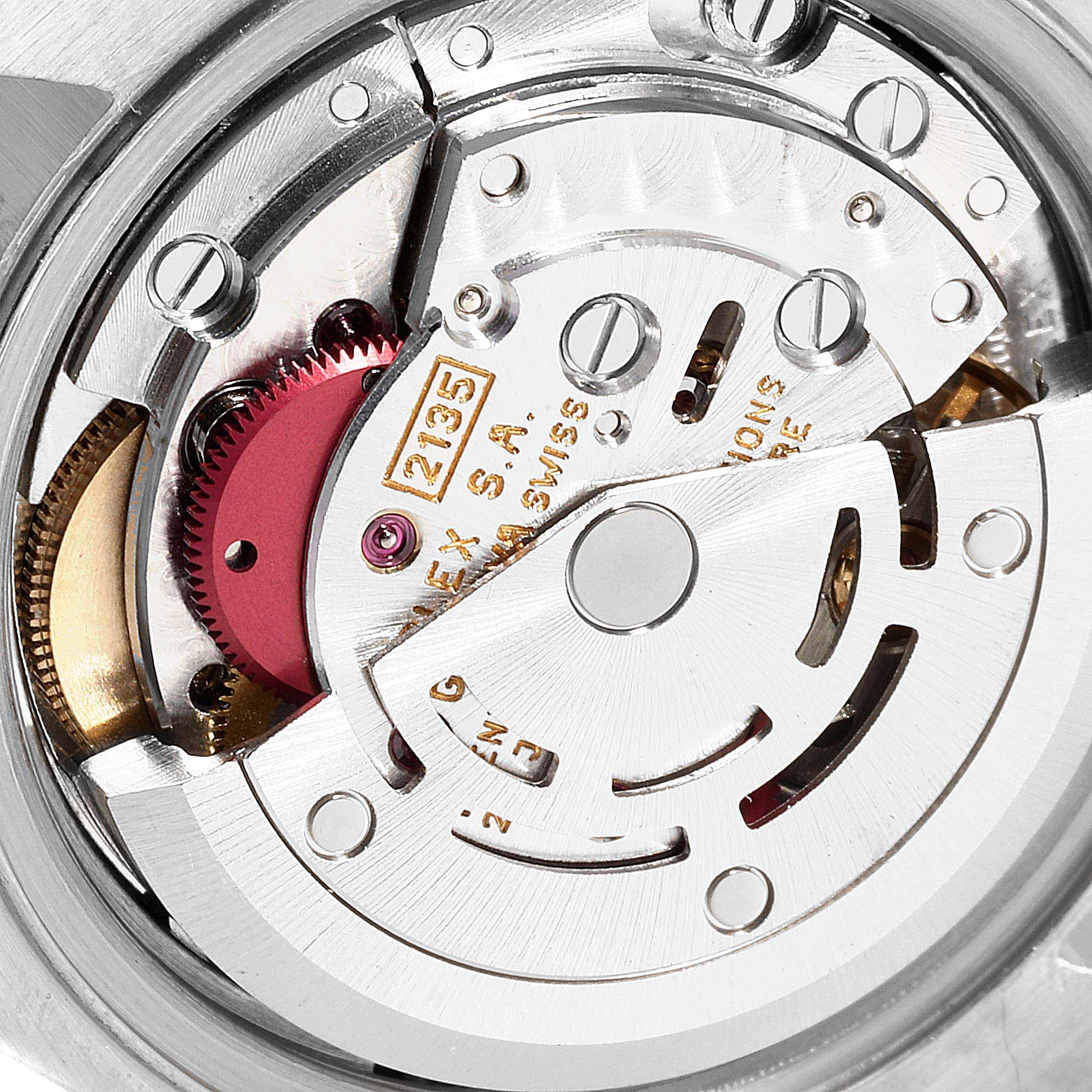The image shows a close-up view of the internal movement mechanism of a Rolex Datejust 69173 Women
s Steel and Gold (two tone) Black Dial 69173 Women
s Steel and Gold (two tone) Black Dial watch.