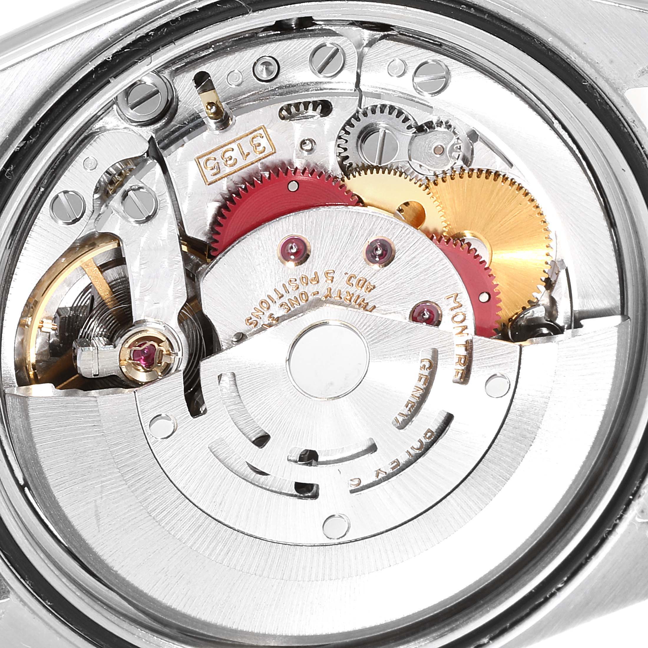 This image shows the movement of a Rolex Datejust 16233 Men's Steel and Gold (two tone) Black Dial 16233 Men's Steel and Gold (two tone) Black Dial watch, focusing on the intricate gears and internal mechanisms.