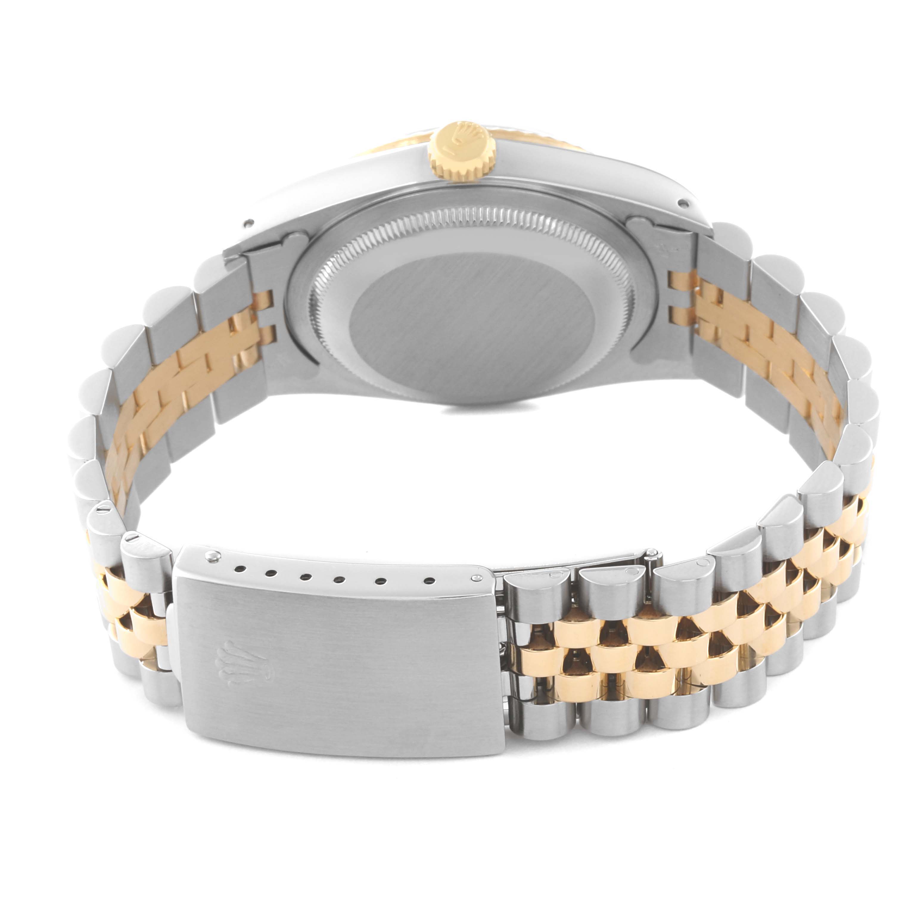 The image shows the back of a Rolex Datejust 16233 Men's Steel and Gold (two tone) Champagne Dial 16233 Men's Steel and Gold (two tone) Champagne Dial watch, highlighting the bracelet and clasp.