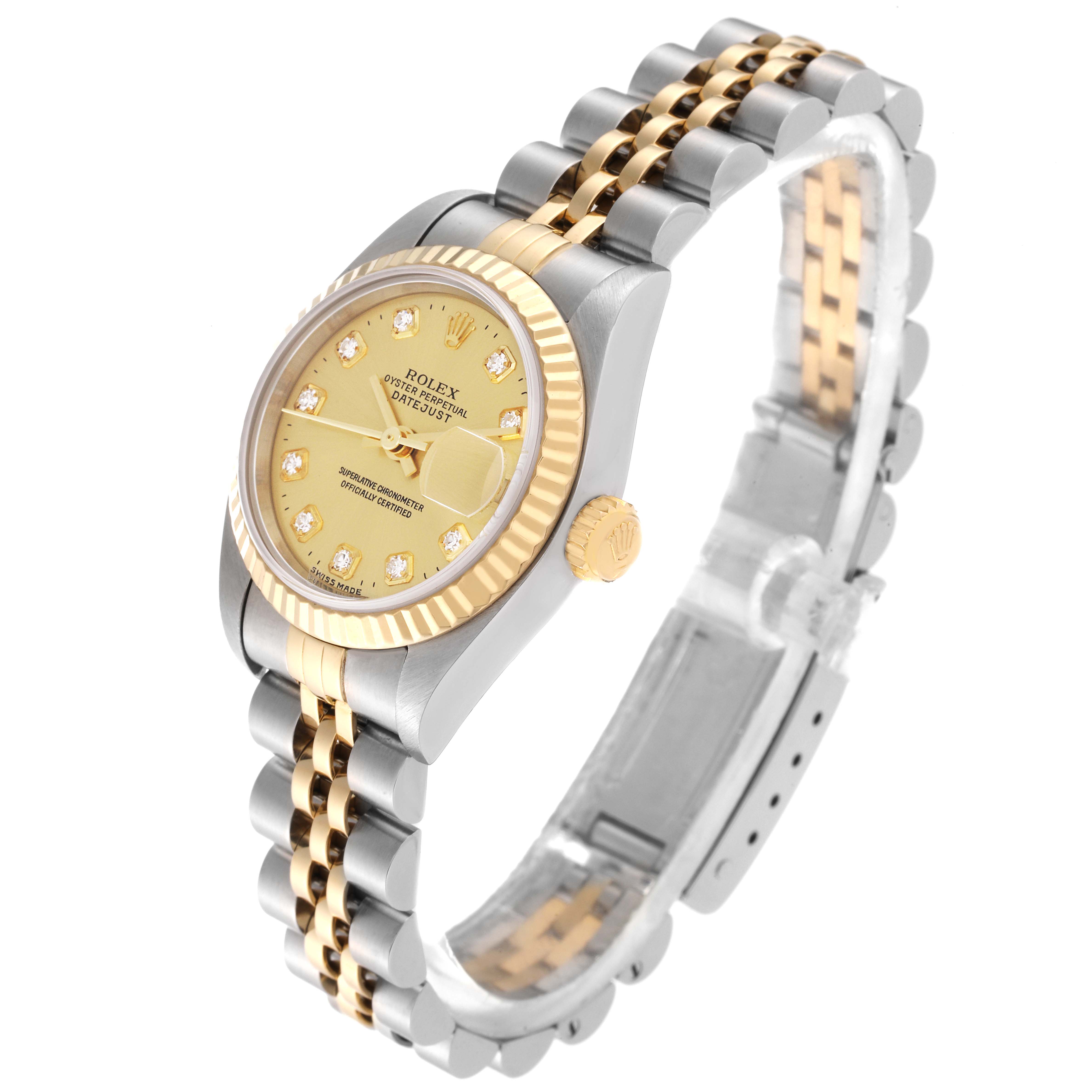 The image shows a Rolex Datejust 79173G Women's Steel and Gold (two tone) Champagne Dial 79173G Women's Steel and Gold (two tone) Champagne Dial watch at an angle displaying its dial, bezel, crown, and two-tone bracelet.