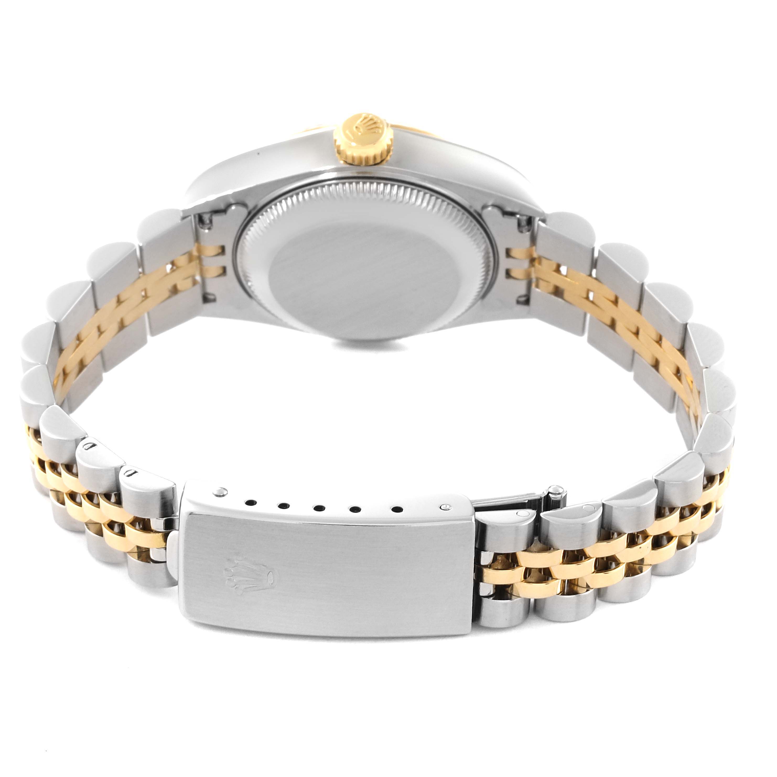 The image shows the back view of a Rolex Datejust 79173G Women's Steel and Gold (two tone) Champagne Dial 79173G Women's Steel and Gold (two tone) Champagne Dial watch, highlighting its case, crown, and two-tone bracelet with clasp.