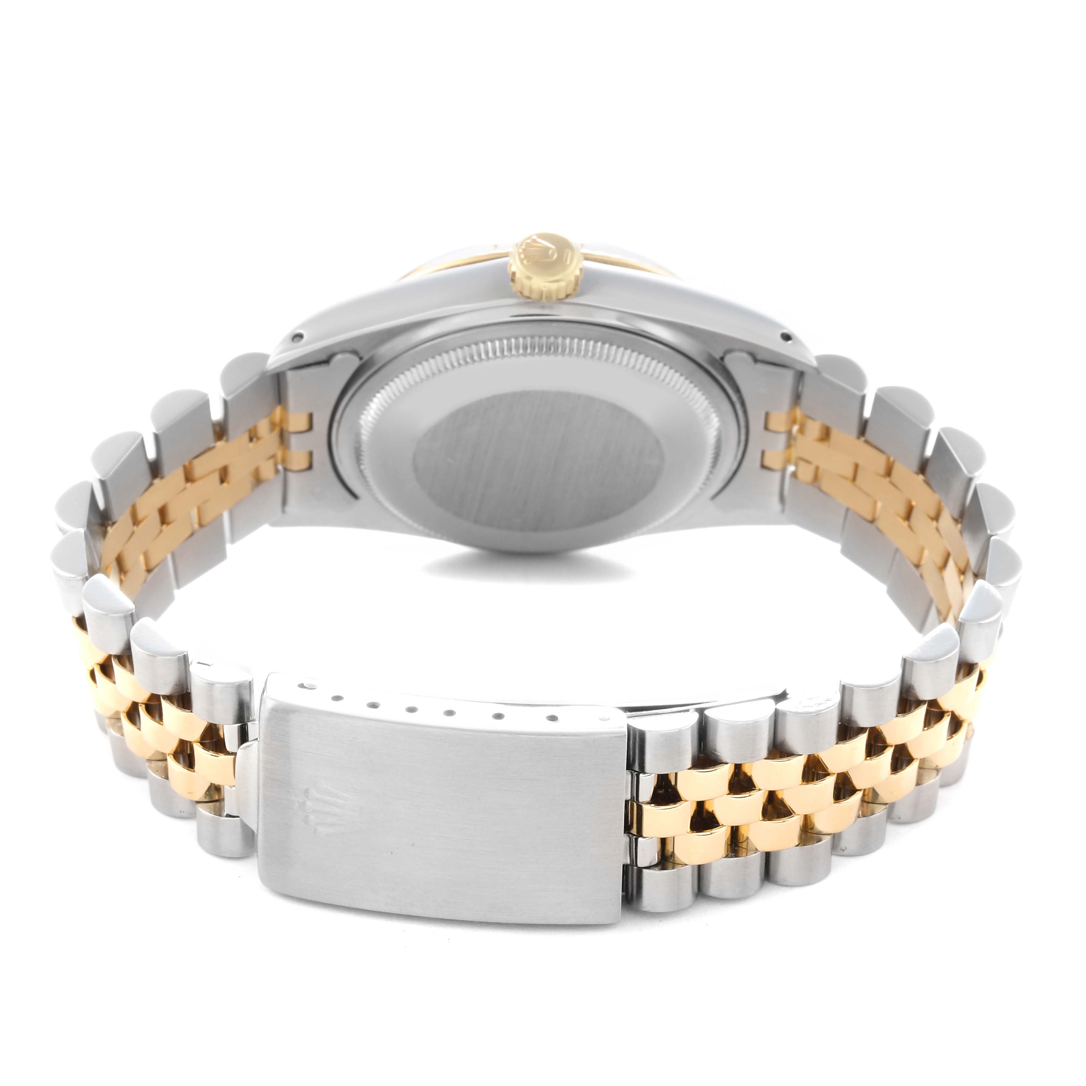 The image shows the back of a Rolex Vintage Collection 16013 Men
s Steel and Gold (two tone) Champagne Dial 16013 Men
s Steel and Gold (two tone) Champagne Dial watch, highlighting its clasp, bracelet, and case back.