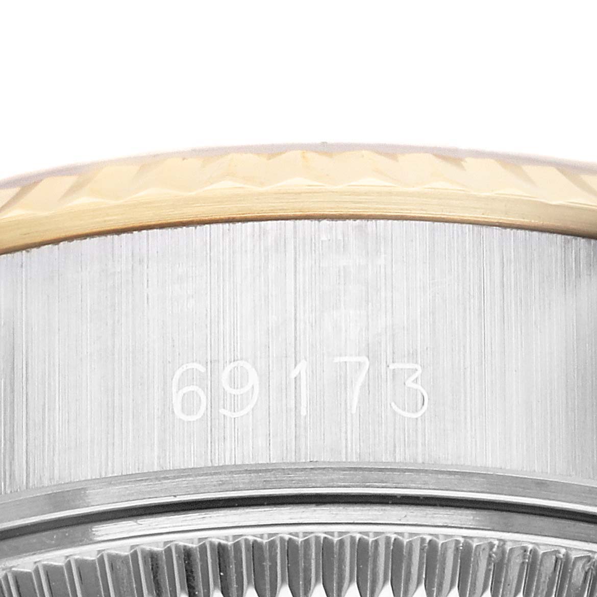 This image shows a close-up of the case and bezel of a Rolex Datejust 69173 Women's Steel and Gold (two tone) White Dial 69173 Women's Steel and Gold (two tone) White Dial model, highlighting the model number 69173.