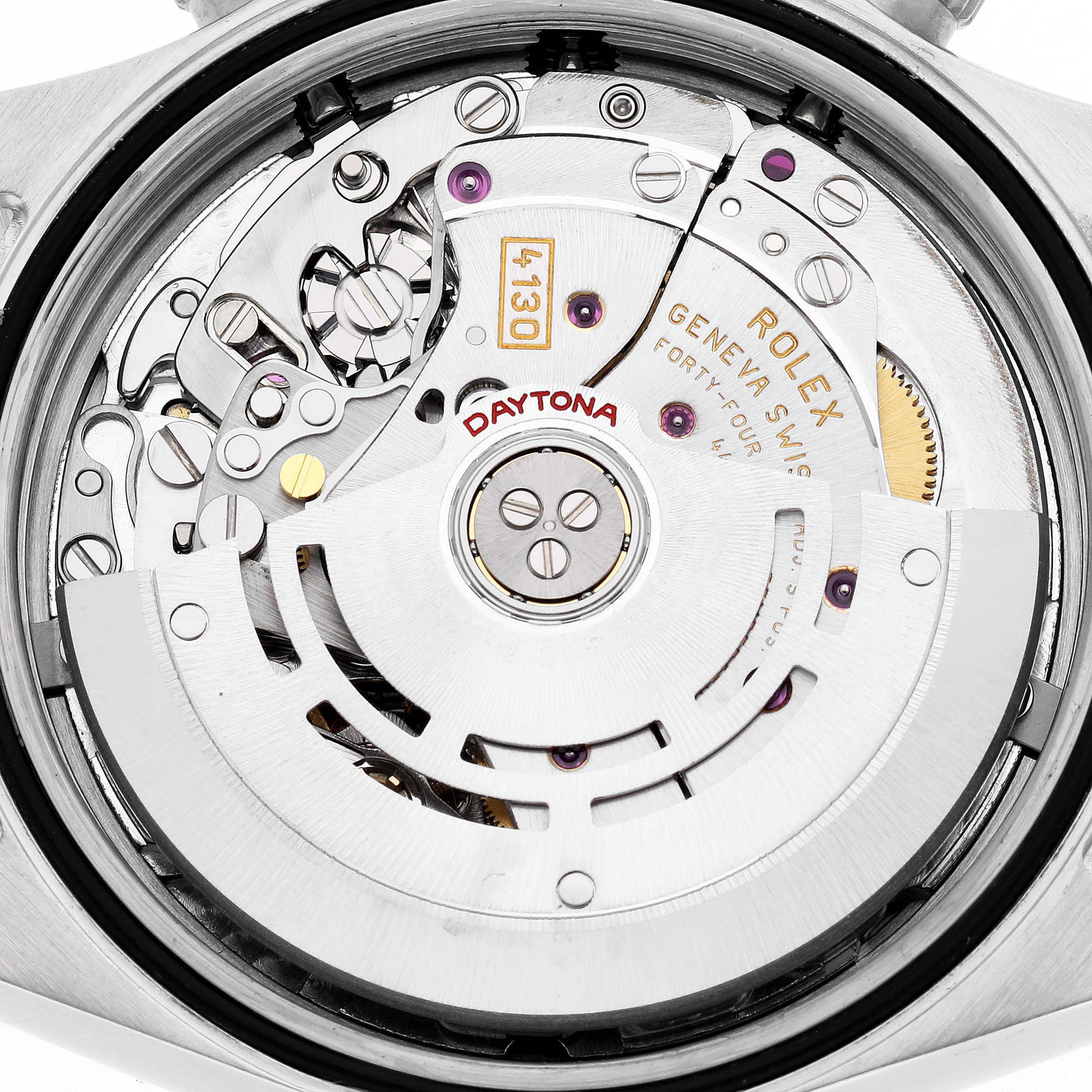 The image shows the back view of a Rolex Daytona 116520 Men
s Stainless Steel Black Dial 116520 Men
s Stainless Steel Black Dial, highlighting its intricate movement and rotor.