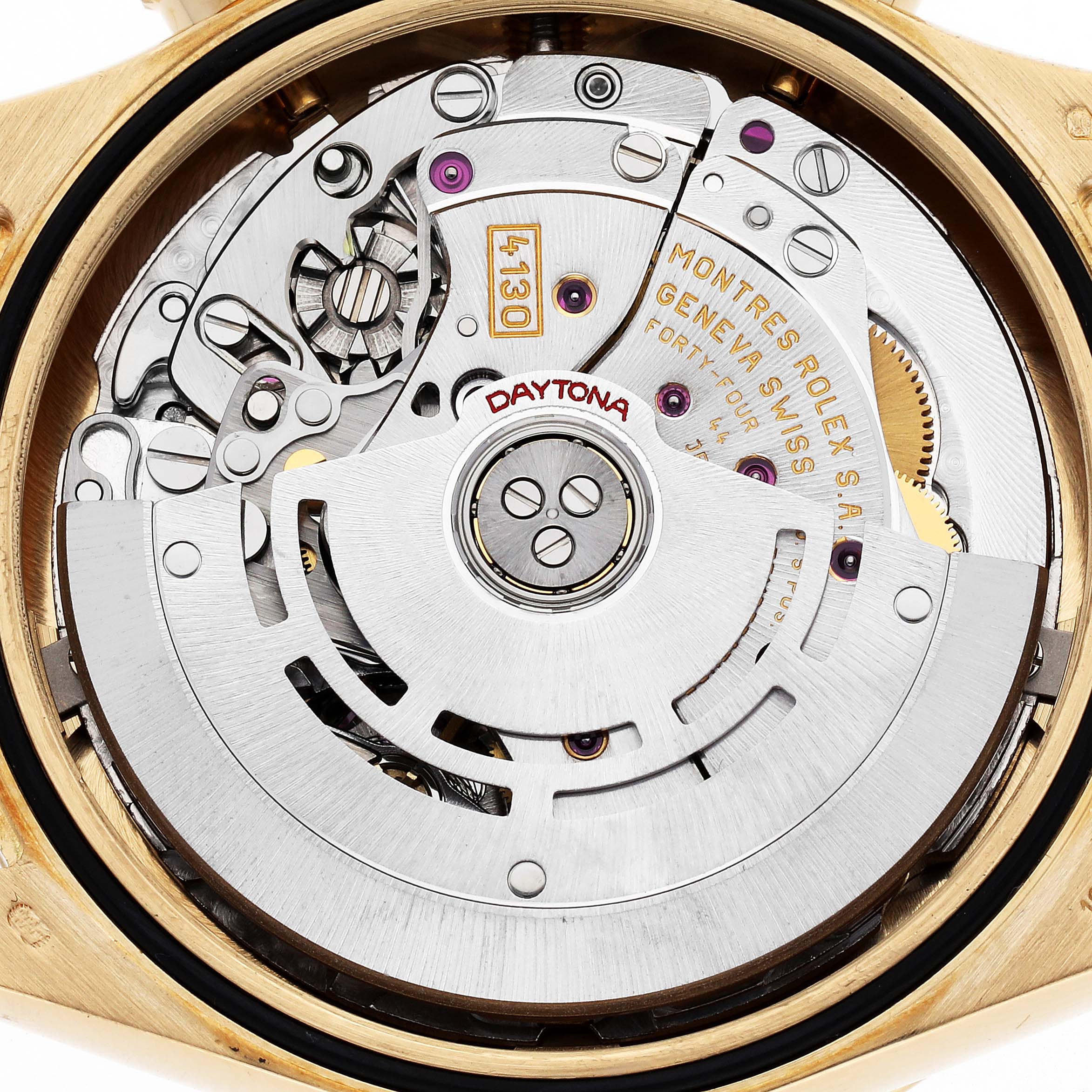 The image shows the movement of a Rolex Daytona 116528 Men
s Yellow Gold White Dial 116528 Men
s Yellow Gold White Dial watch, viewed from the back, highlighting gears and the rotor.