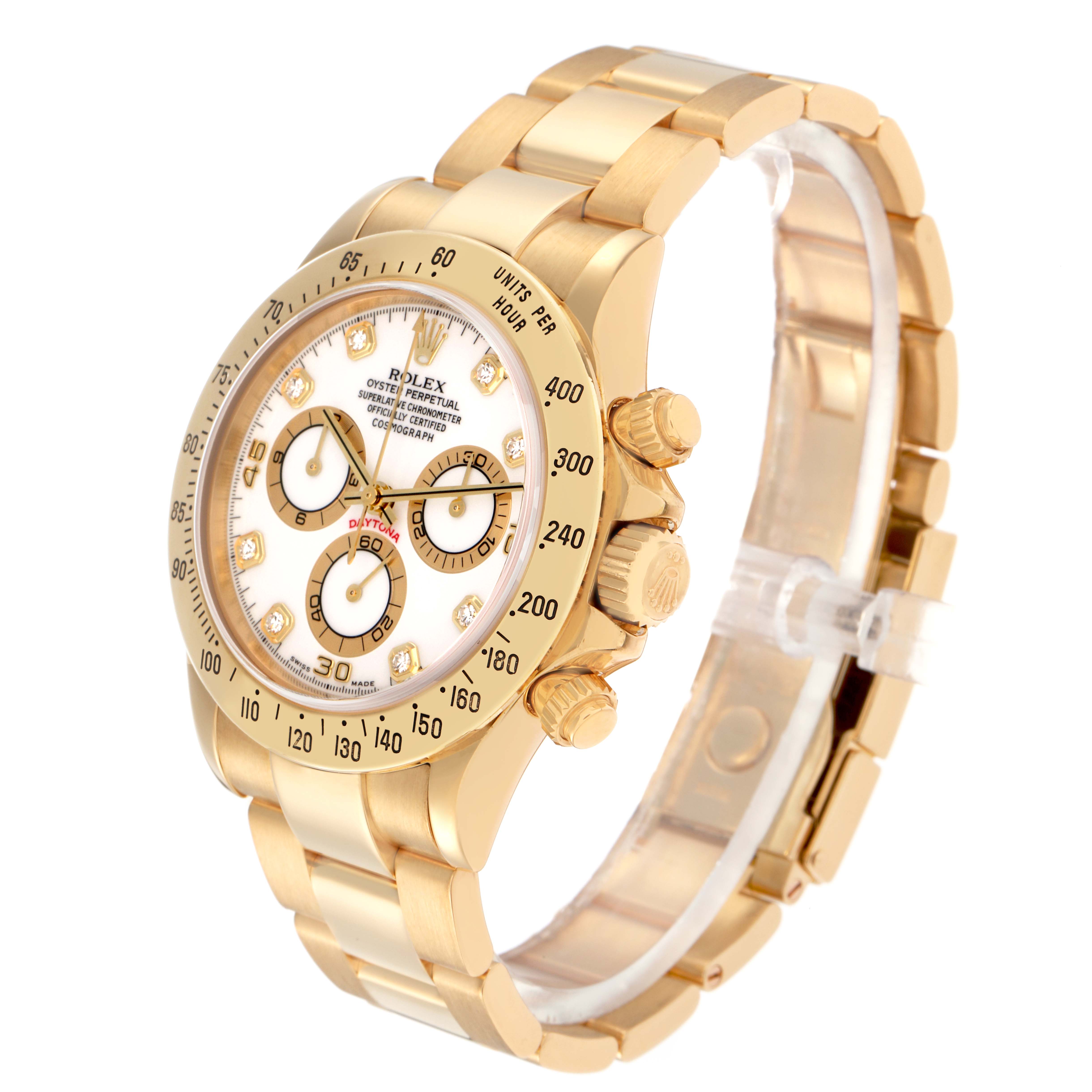 The Rolex Daytona 116528 Men
s Yellow Gold White Dial 116528 Men
s Yellow Gold White Dial watch is angled slightly from above, showing the dial, bezel, crown, pushers, and part of the bracelet.