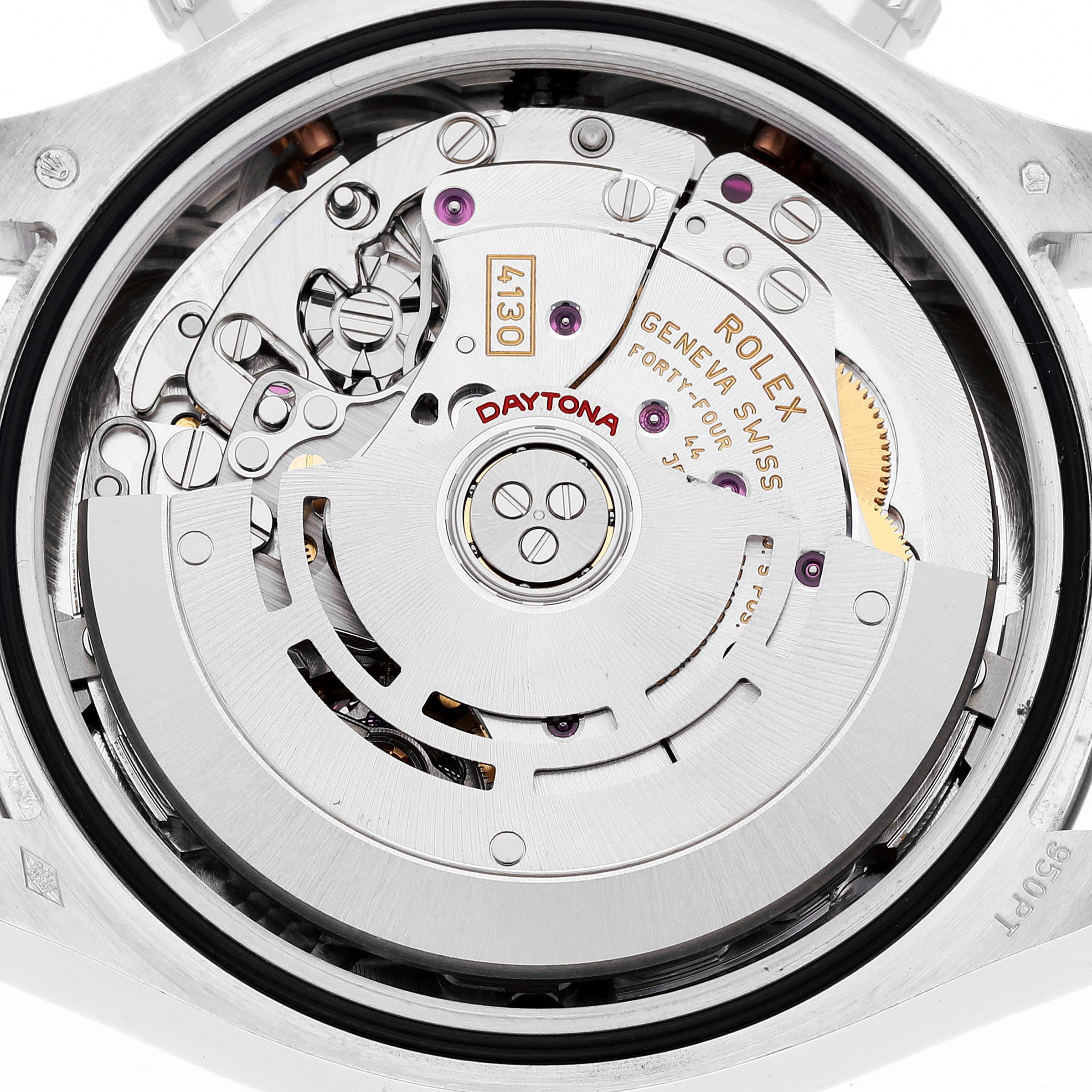 The image shows the back view of the Rolex Daytona 116506 Men's Platinum Blue Dial 116506 Men's Platinum Blue Dial watch, revealing its intricate movement and internal components.