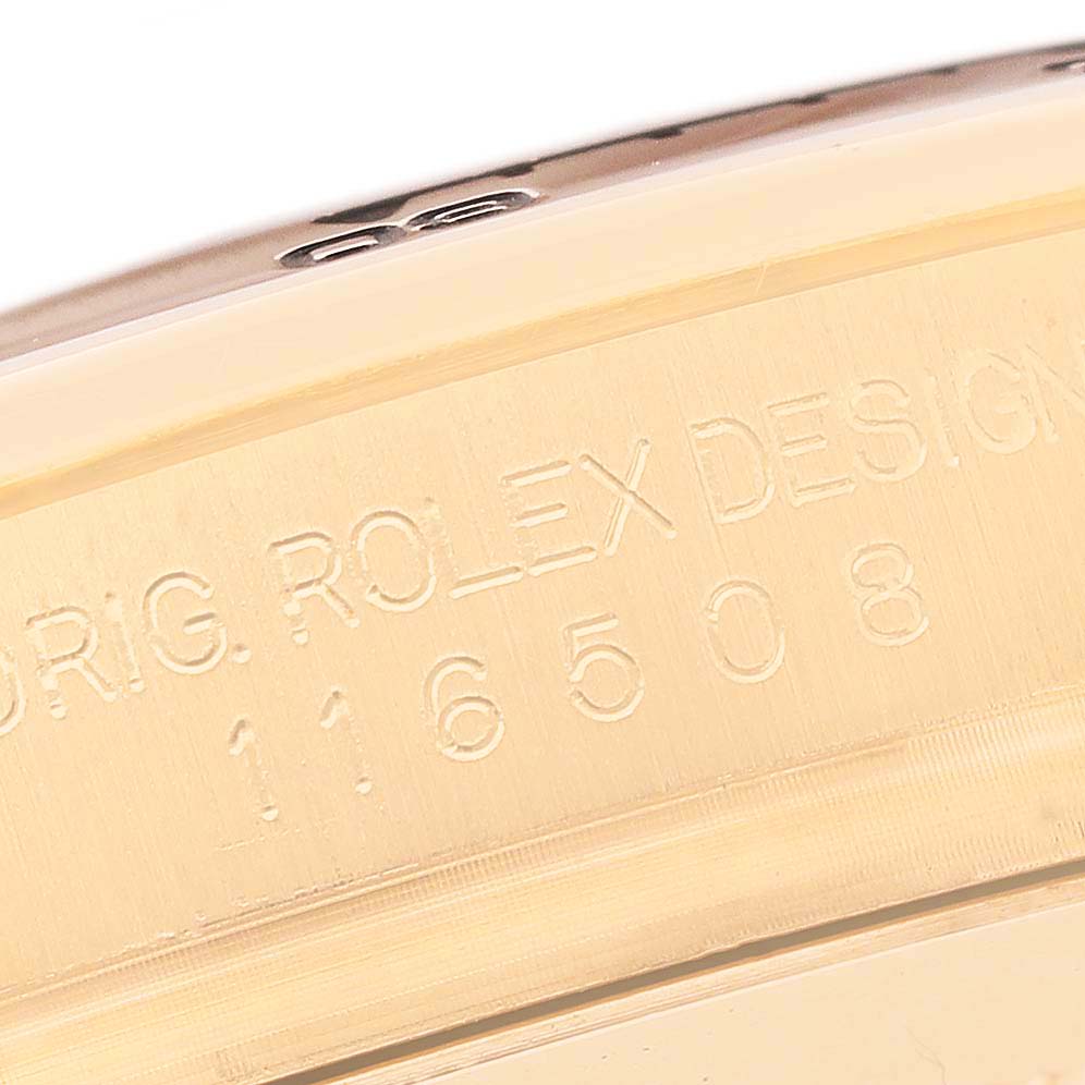 The image shows a close-up of the engraved model number and "ROLEX DESIGN" on the side of a Rolex Daytona 116508 Men's Yellow Gold Black Dial watch case.