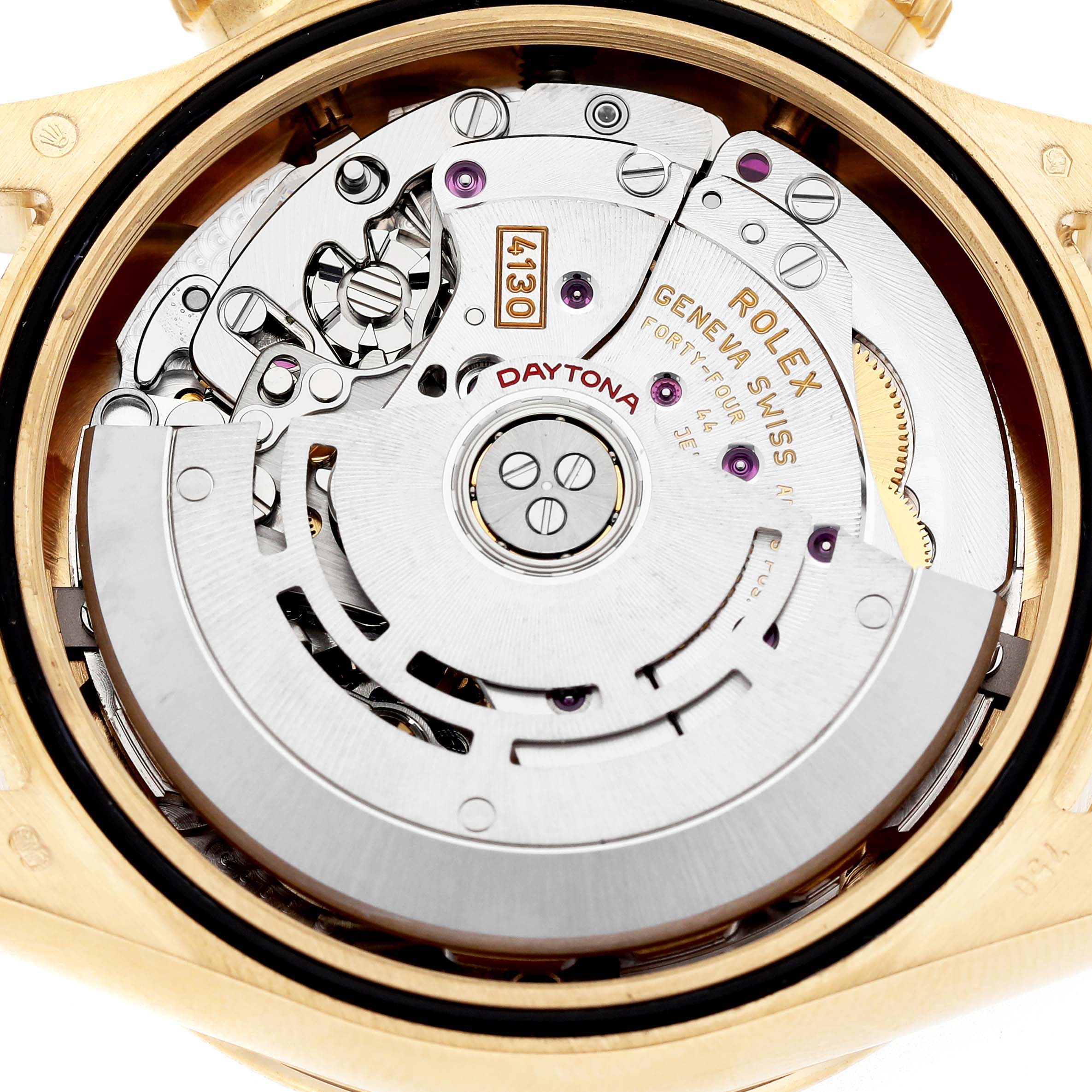 The image showcases the movement of a Rolex Daytona 116508 Men's Yellow Gold Black Dial watch viewed from the back, highlighting the intricate mechanics.