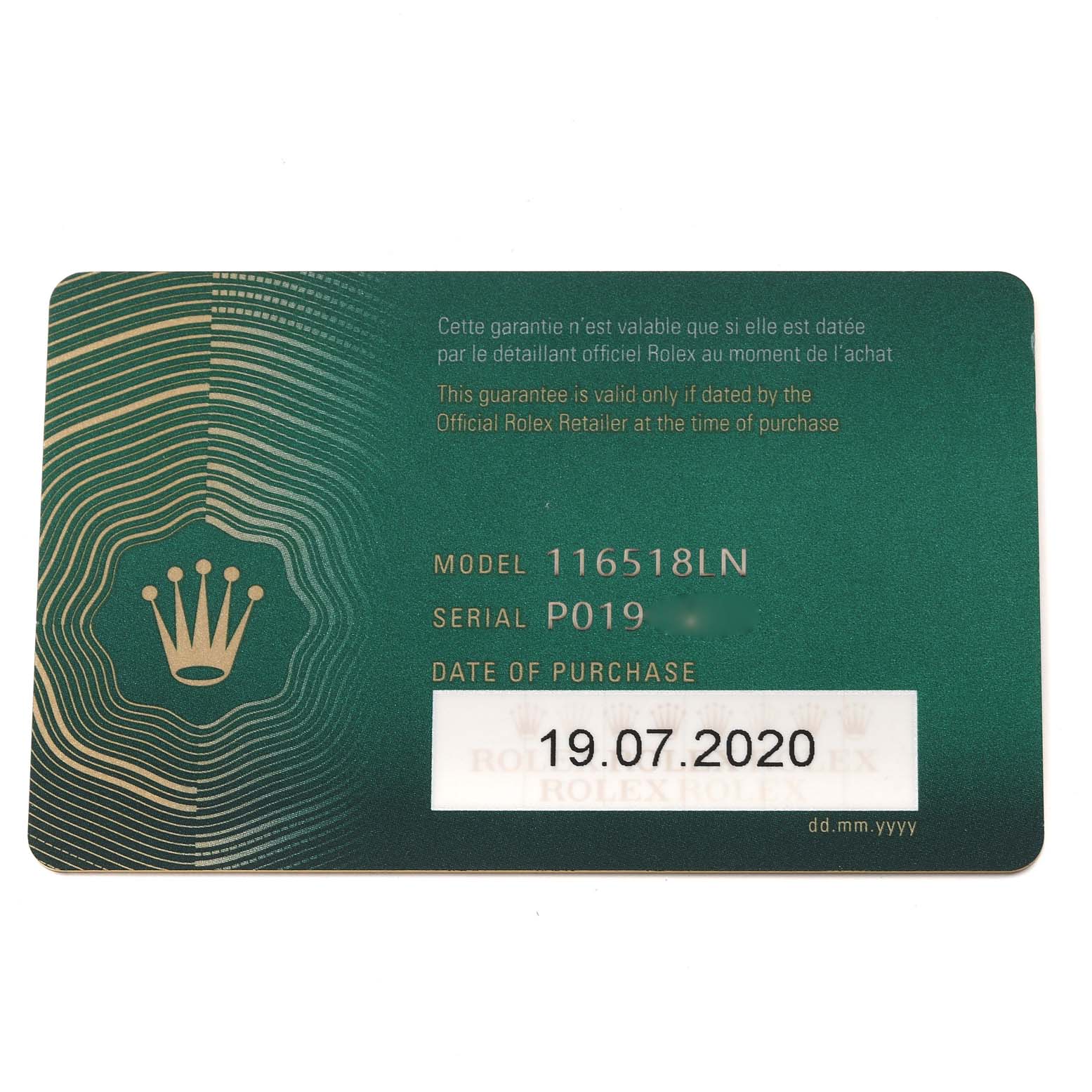 This image shows the guarantee card for a Rolex Daytona 116518 Men's Yellow Gold Black Dial 116518 Men's Yellow Gold Black Dial model 116518LN, displaying the model and serial number along with the purchase date.