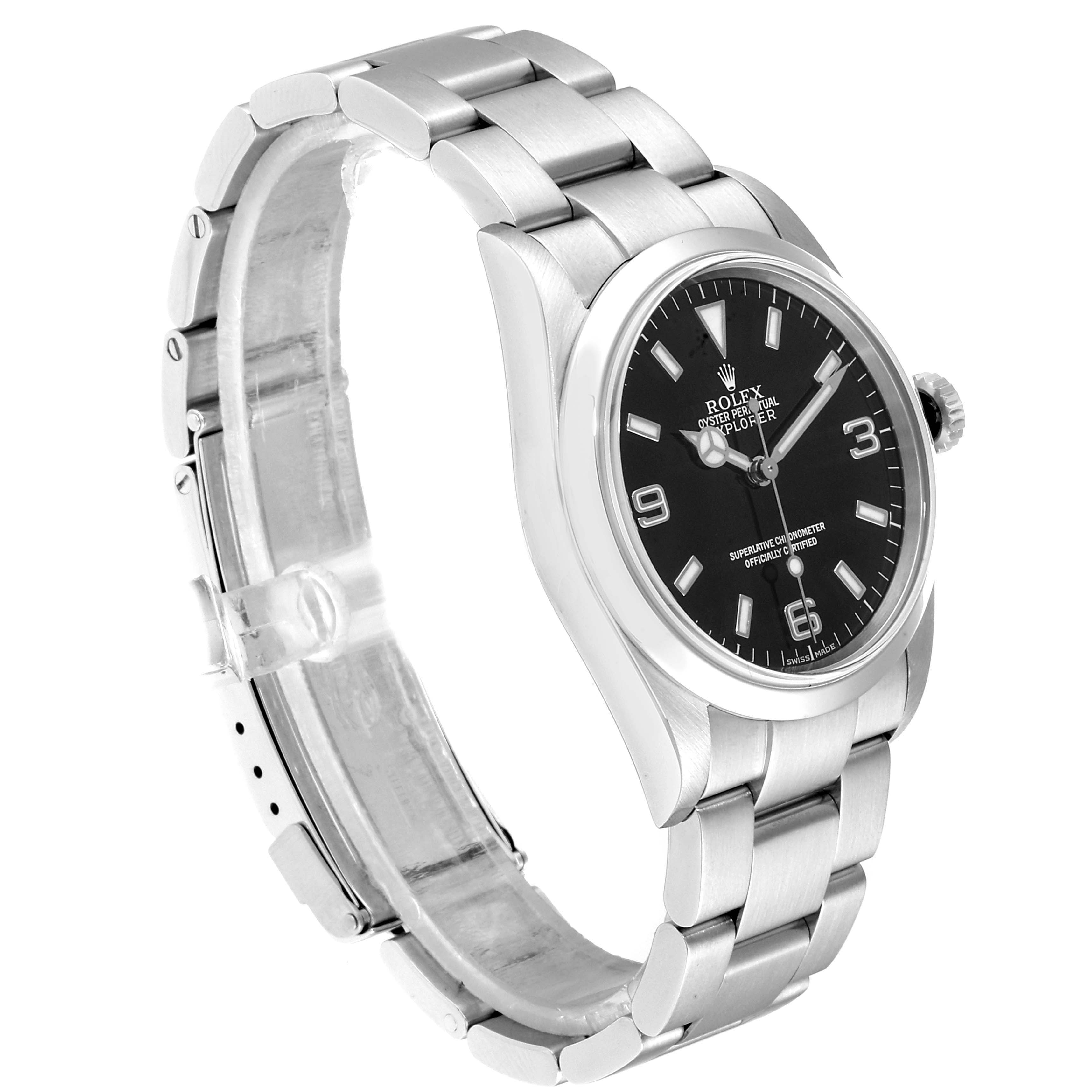 The Rolex Explorer 114270 Men
s Stainless Steel Black Dial 114270 Men
s Stainless Steel Black Dial watch is shown from an angle highlighting its black dial, case, and stainless steel bracelet.