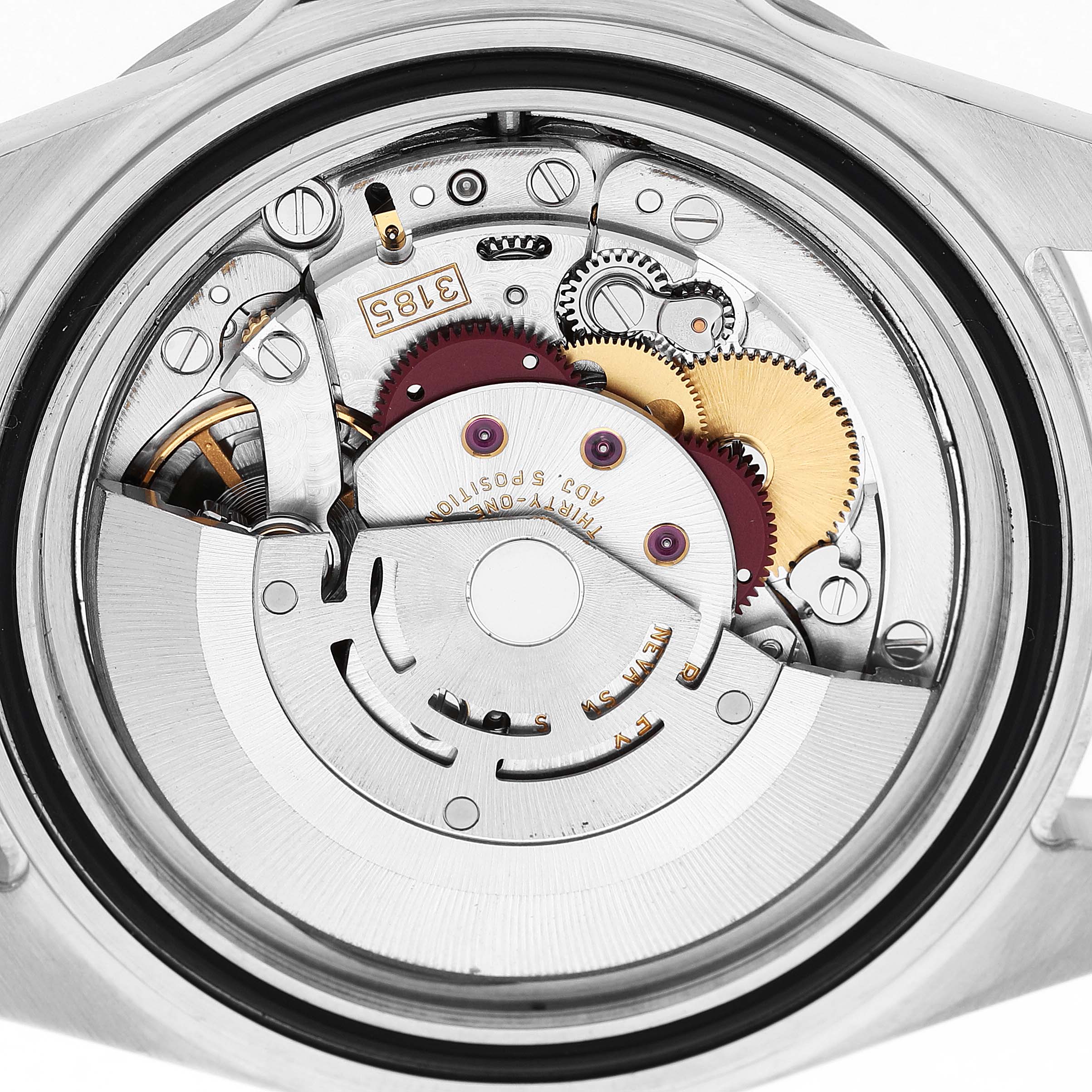The image shows the Rolex Explorer 16570 Men's Stainless Steel Black Dial's movement from a top-down angle, highlighting its intricate gears and rotor.