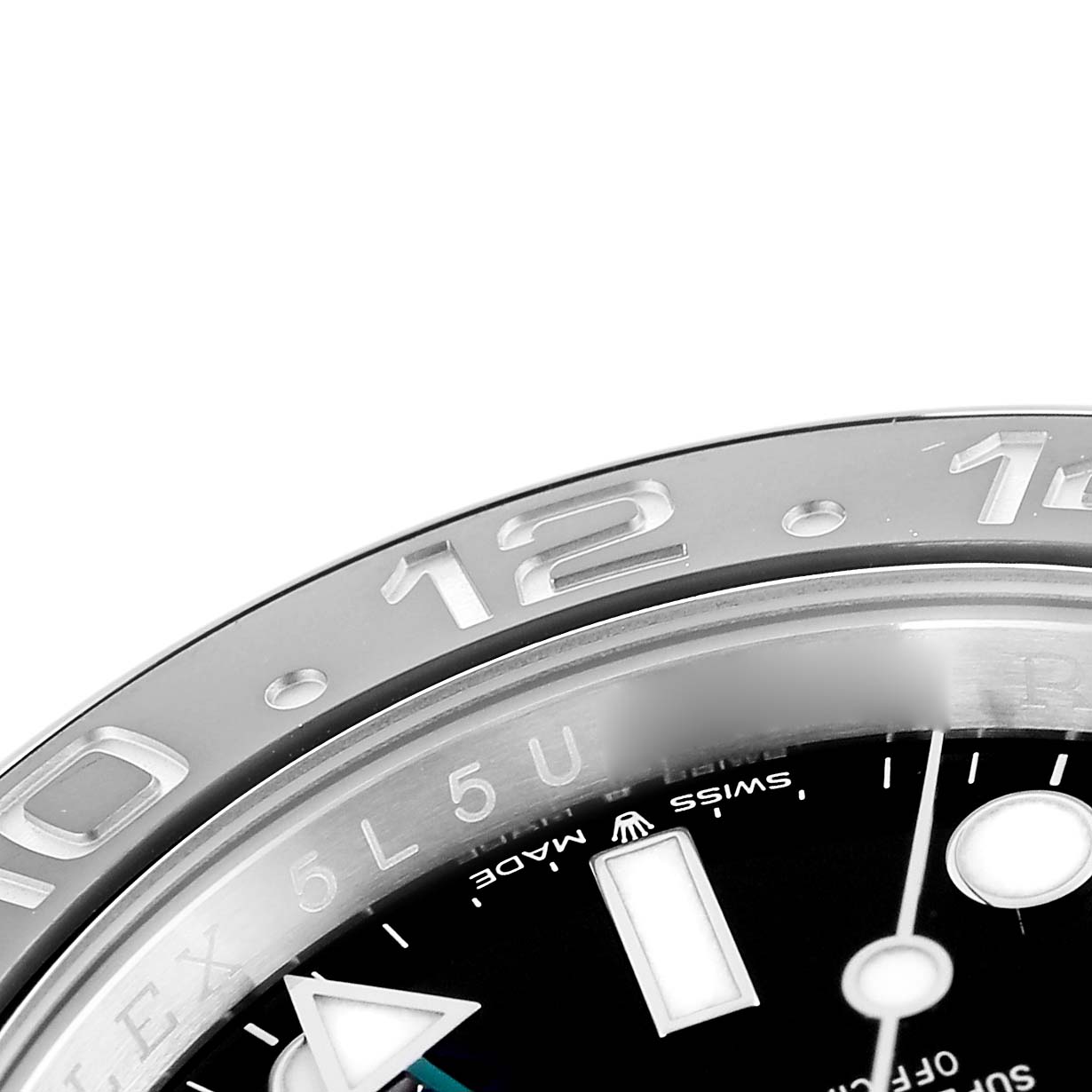 The image shows a partial view of the Rolex GMT-Master 126710 Men
s Stainless Steel Black Dial 126710 Men
s Stainless Steel Black Dial
s bezel and part of the dial with hour markers.