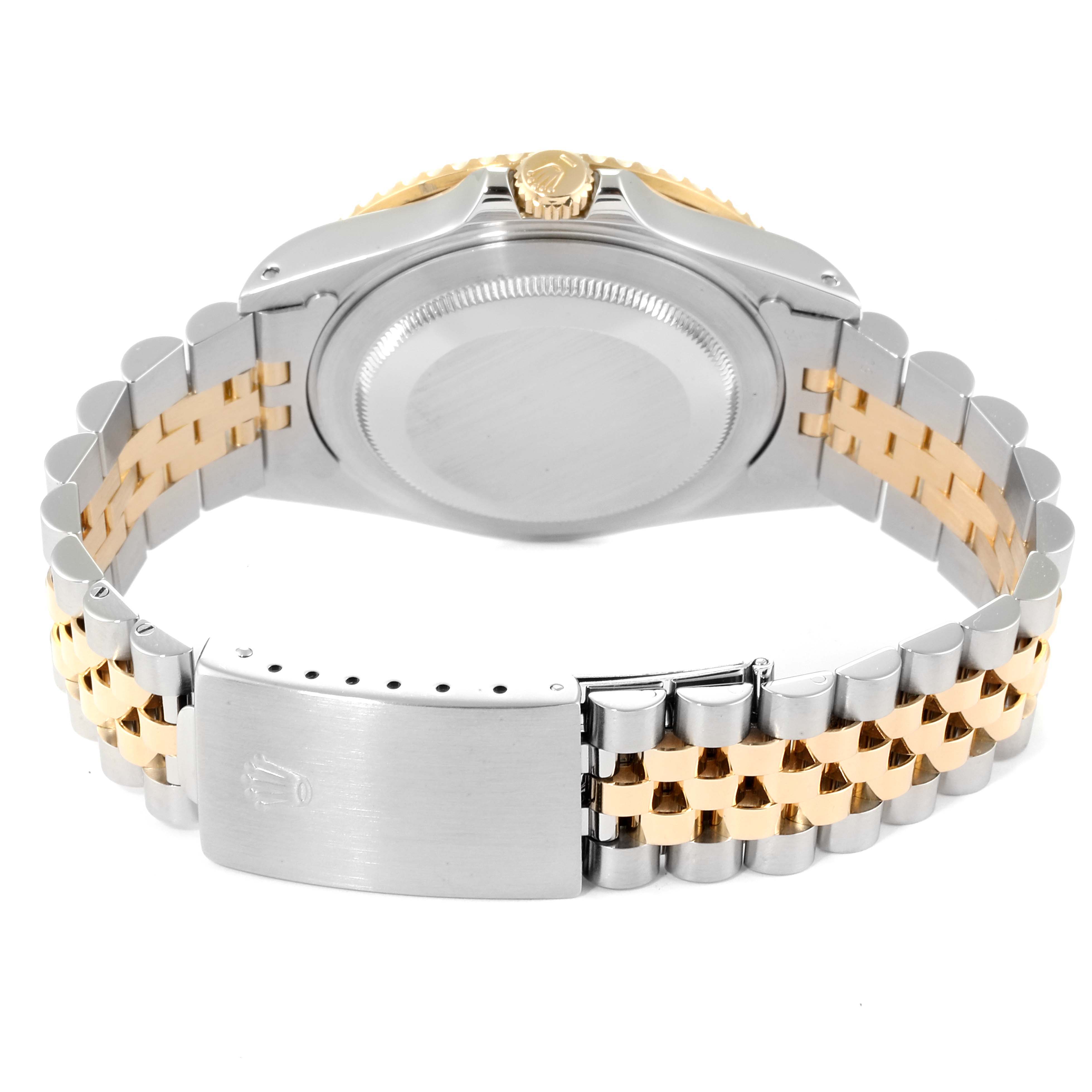 The image shows the case back, crown, and bracelet of a Rolex GMT-Master 16713 Men's Steel and Gold (two tone) Black Dial 16713 Men's Steel and Gold (two tone) Black Dial watch, viewed from the rear.