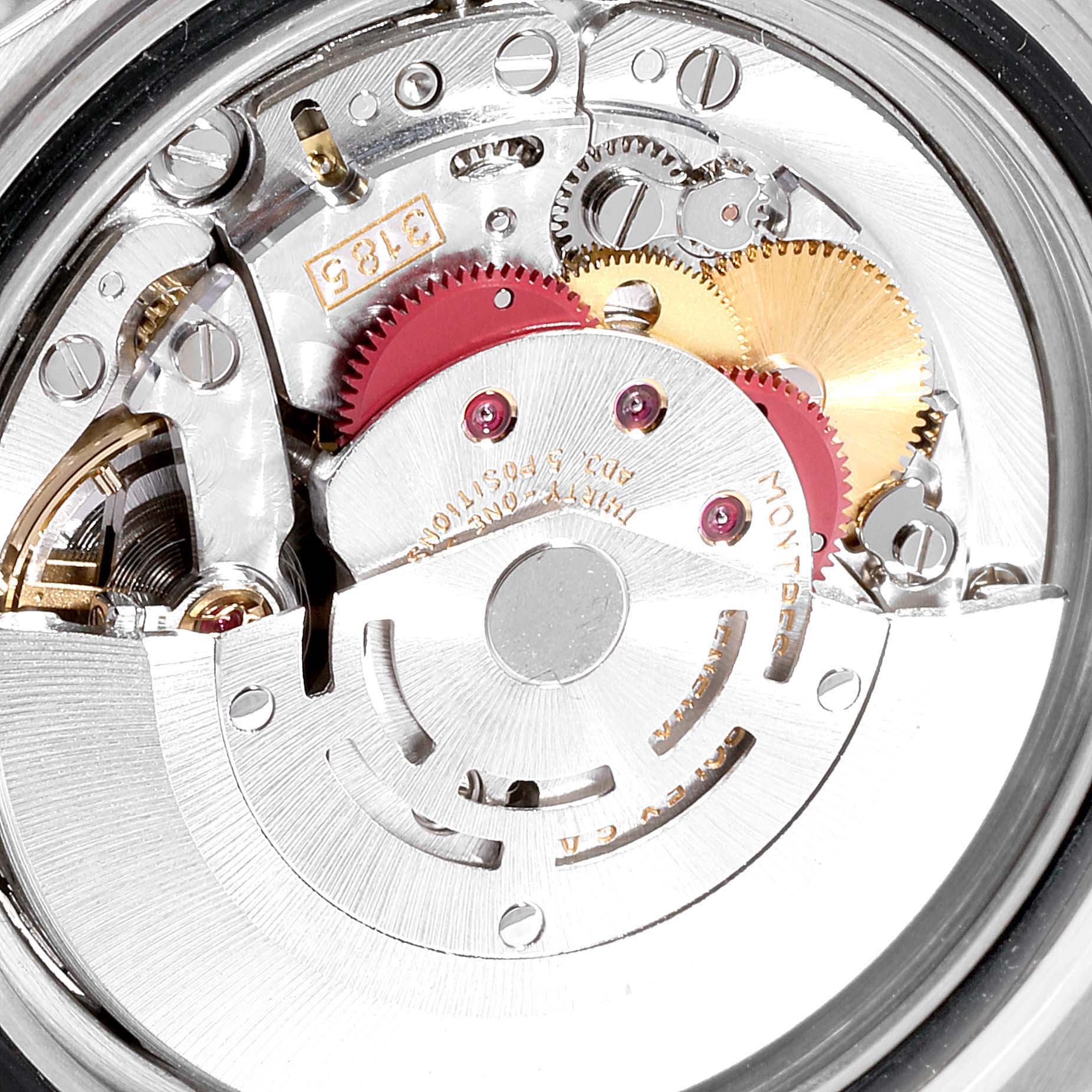 This image shows a close-up view of the internal mechanism of a Rolex GMT-Master 16713 Men's Steel and Gold (two tone) Black Dial 16713 Men's Steel and Gold (two tone) Black Dial watch.