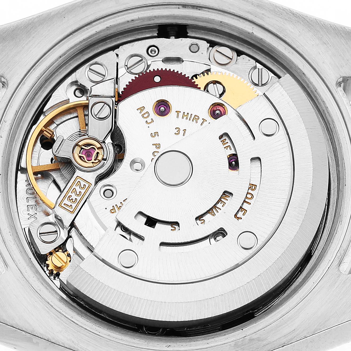 The image shows the movement of the Rolex Oyster Perpetual 176210 Women's Stainless Steel Black Dial watch from a top-down angle, revealing gears and intricate mechanisms.