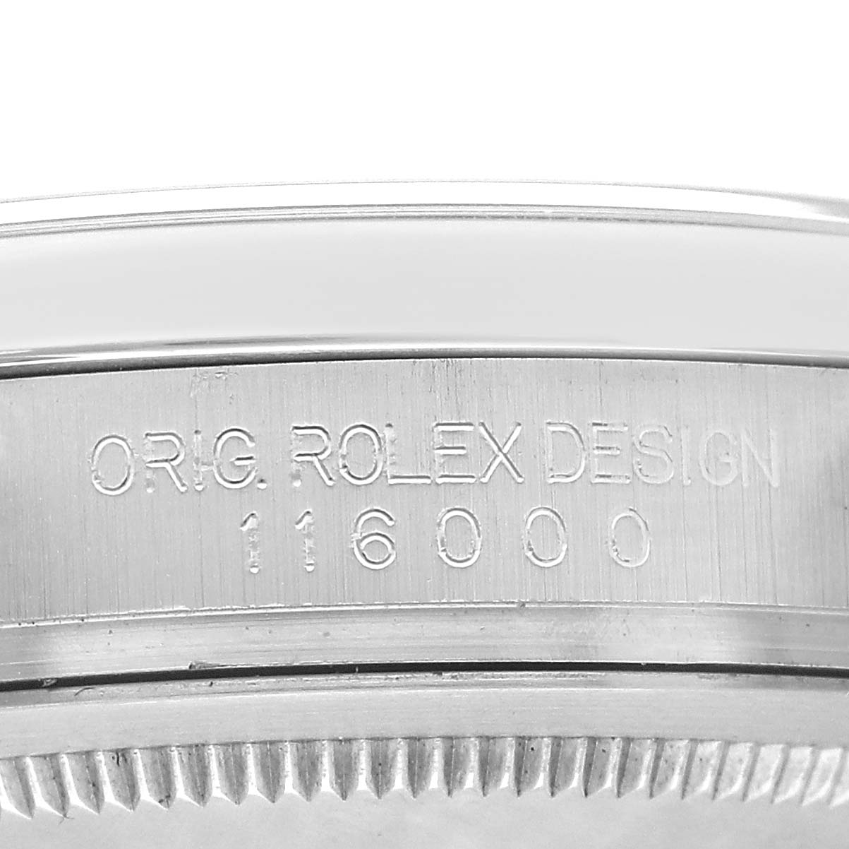 The image shows a close-up of the side engraving on a Rolex Oyster Perpetual 116000 Men's Stainless Steel Black Dial, displaying the model number "116000."