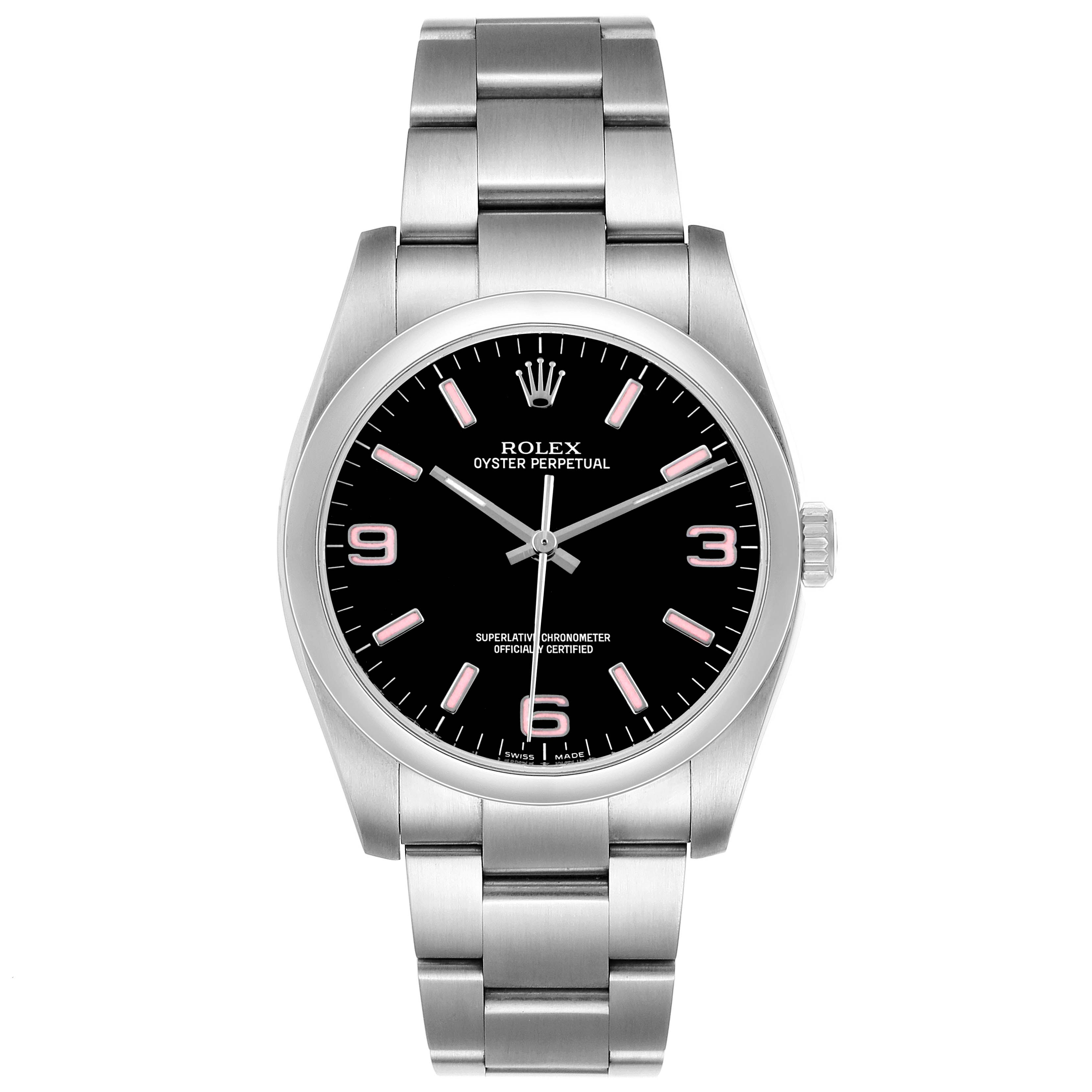 The Rolex Oyster Perpetual 116000 Men's Stainless Steel Black Dial watch is shown from a front angle, highlighting its black dial, hour markers, hands, and stainless steel bracelet.