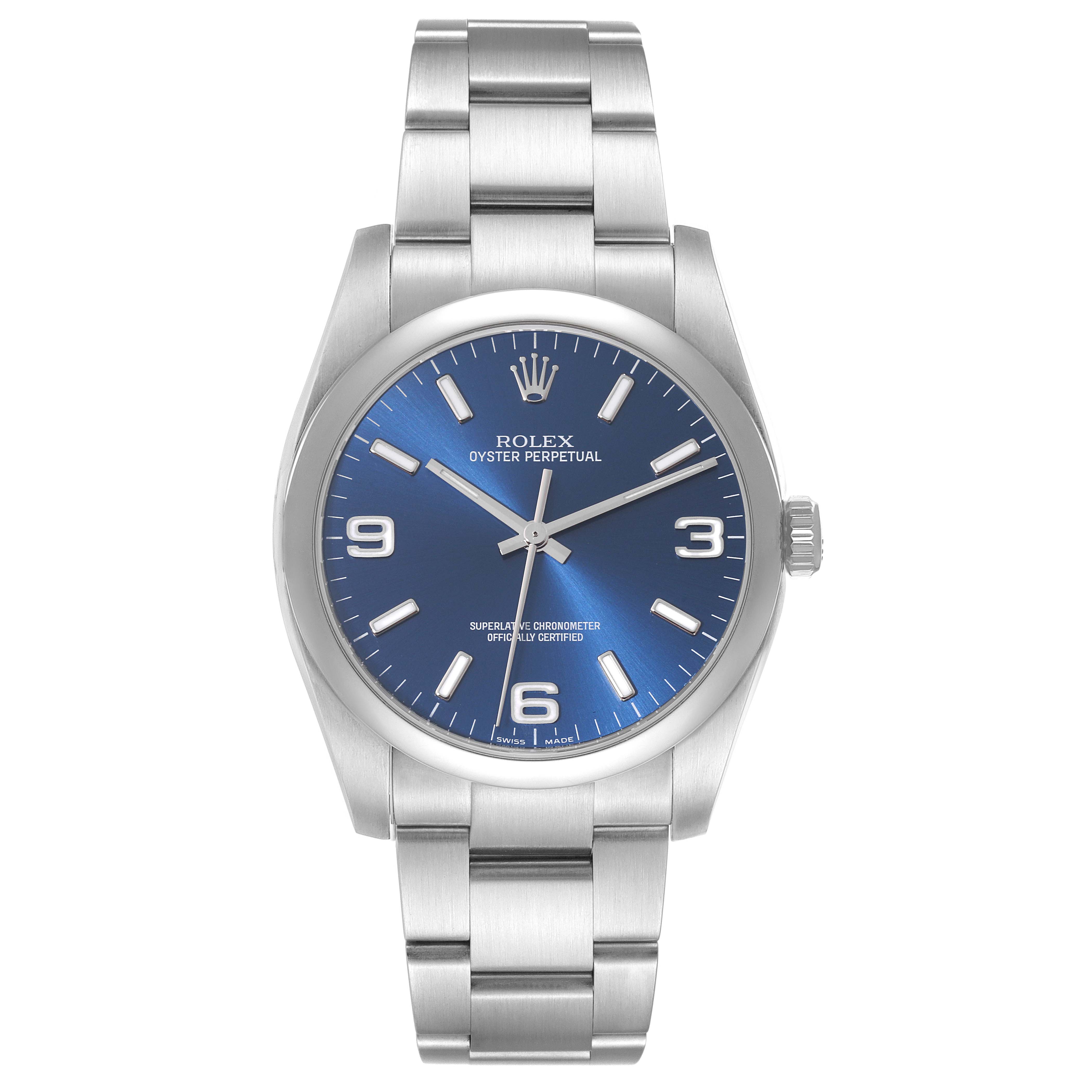 The image shows a front view of the Rolex Oyster Perpetual 116000 Men's Stainless Steel Blue Dial 116000 Men's Stainless Steel Blue Dial watch, highlighting its blue dial, silver hour markers, and stainless steel bracelet.