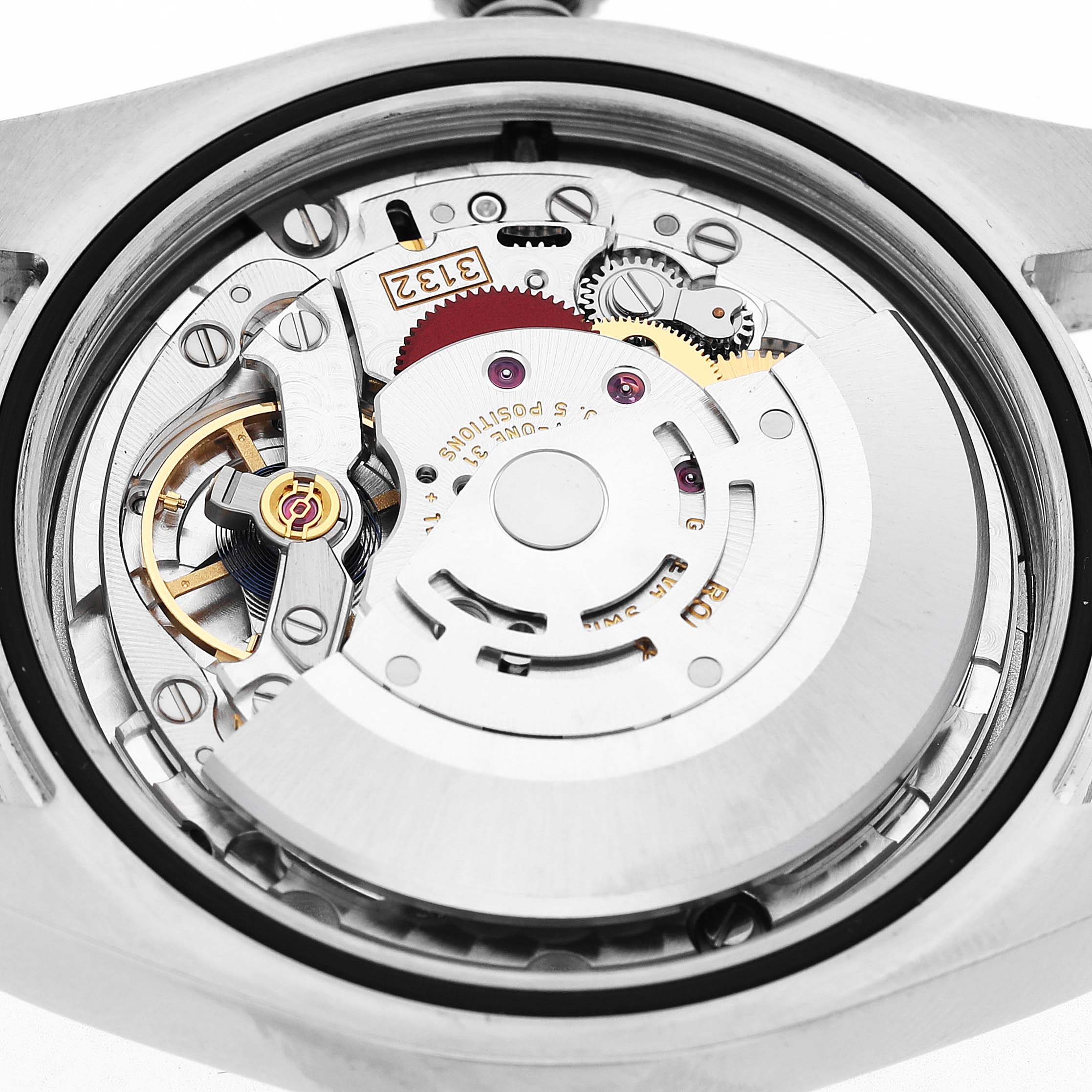 This image shows the back view of a Rolex Oyster Perpetual 114300 Men's Stainless Steel Blue Dial, highlighting its intricate automatic movement mechanism.