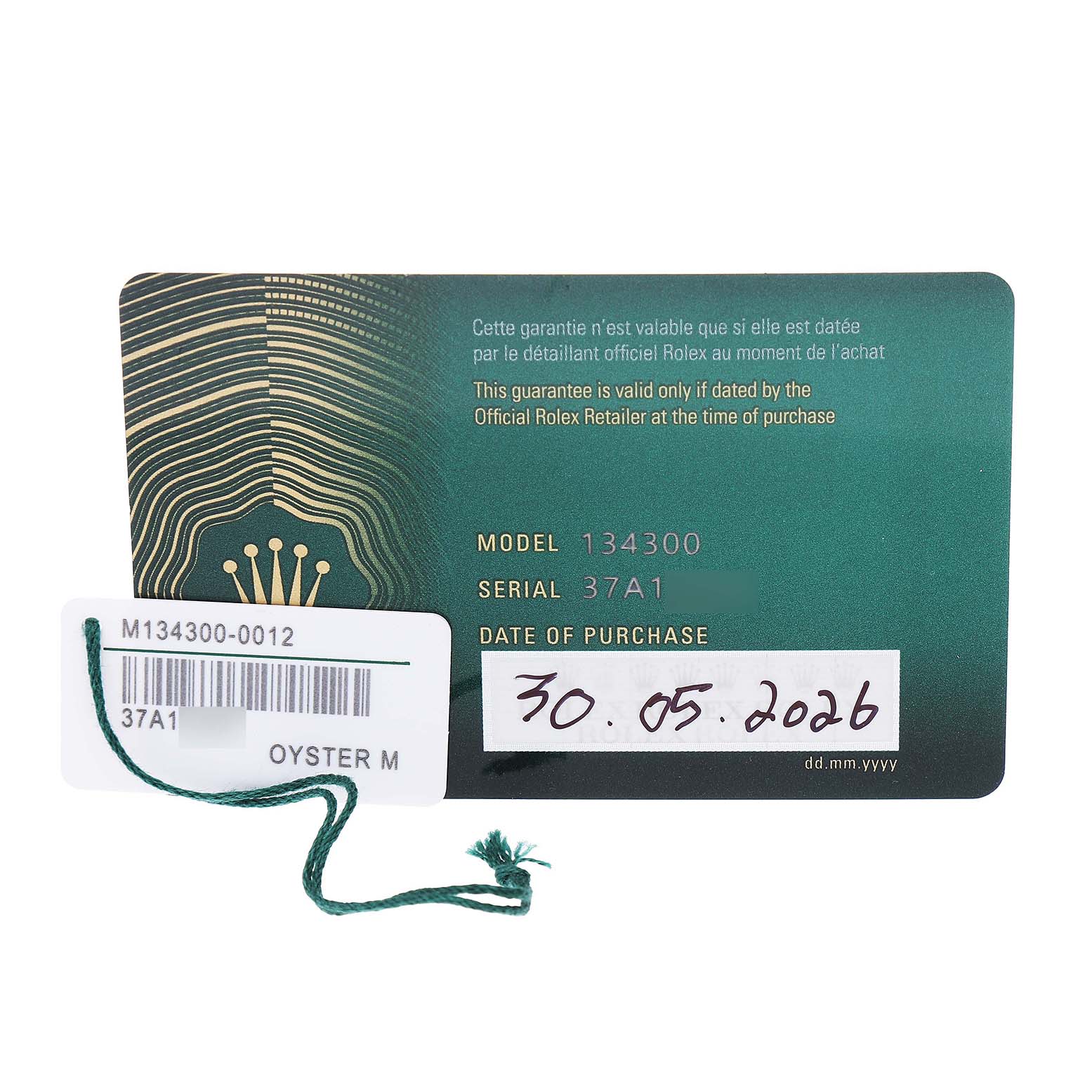The image shows the warranty card and tag for a Rolex Oyster Perpetual 134300 Men's Stainless Steel Purple Dial, model 134300.
