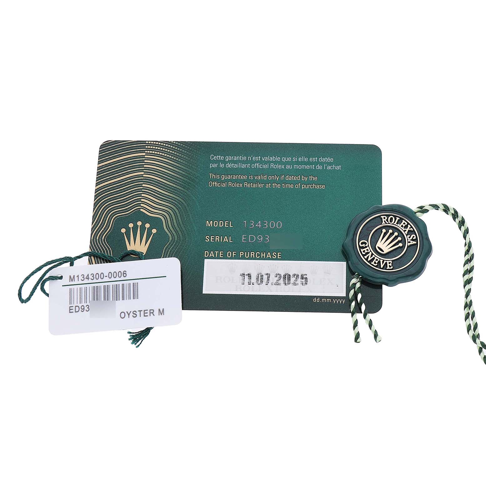 The image shows a Rolex Oyster Perpetual 134300 Men's Stainless Steel Green Dial model warranty card and a seal with tags.