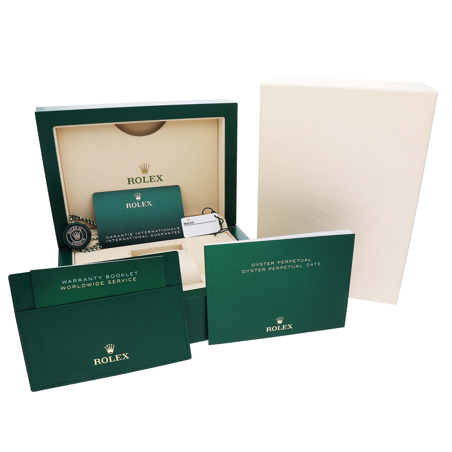 The image shows a Rolex Oyster Perpetual 134300 Men's Stainless Steel Green Dial box, warranty card, booklets, and tags from a front angle.