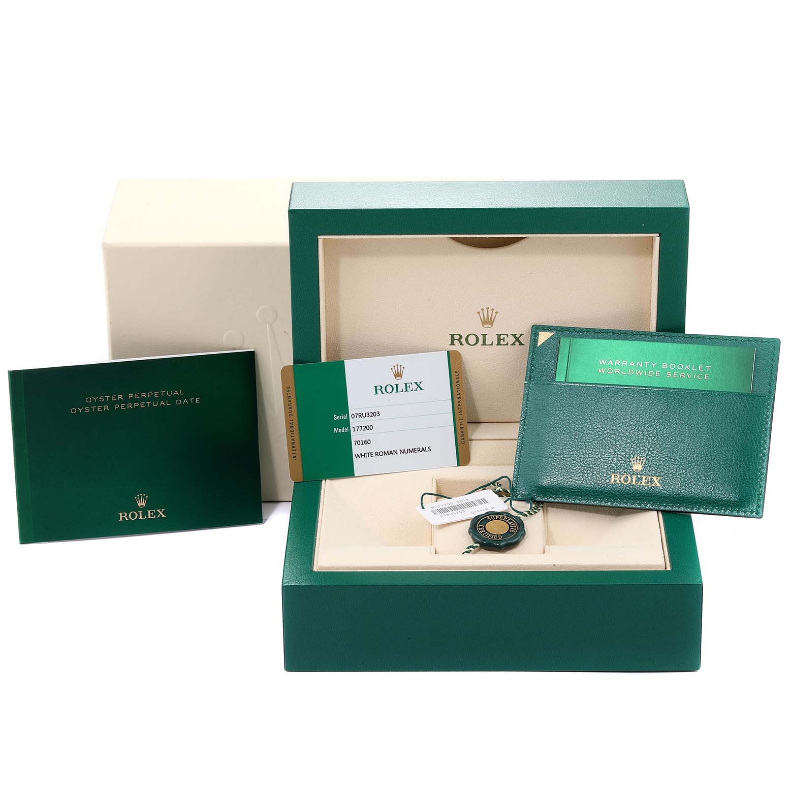 The image shows the packaging box, warranty card, booklet, and other accessories for a Rolex Mid-Size 177200  Women
s Stainless Steel White Dial 177200  Women
s Stainless Steel White Dial watch.