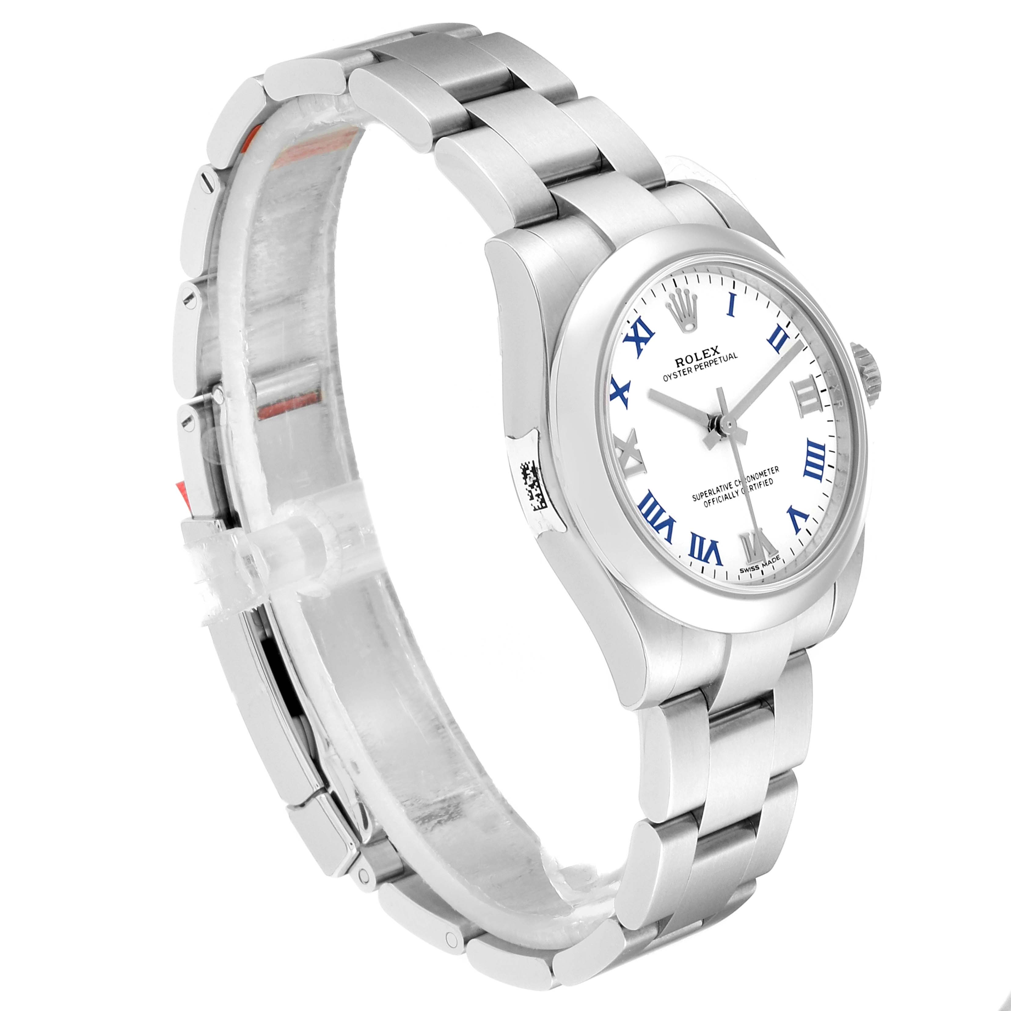 The Rolex Mid-Size 177200  Women
s Stainless Steel White Dial 177200  Women
s Stainless Steel White Dial watch is shown at an oblique angle, highlighting the bracelet, case, and dial with Roman numerals and blue accents.