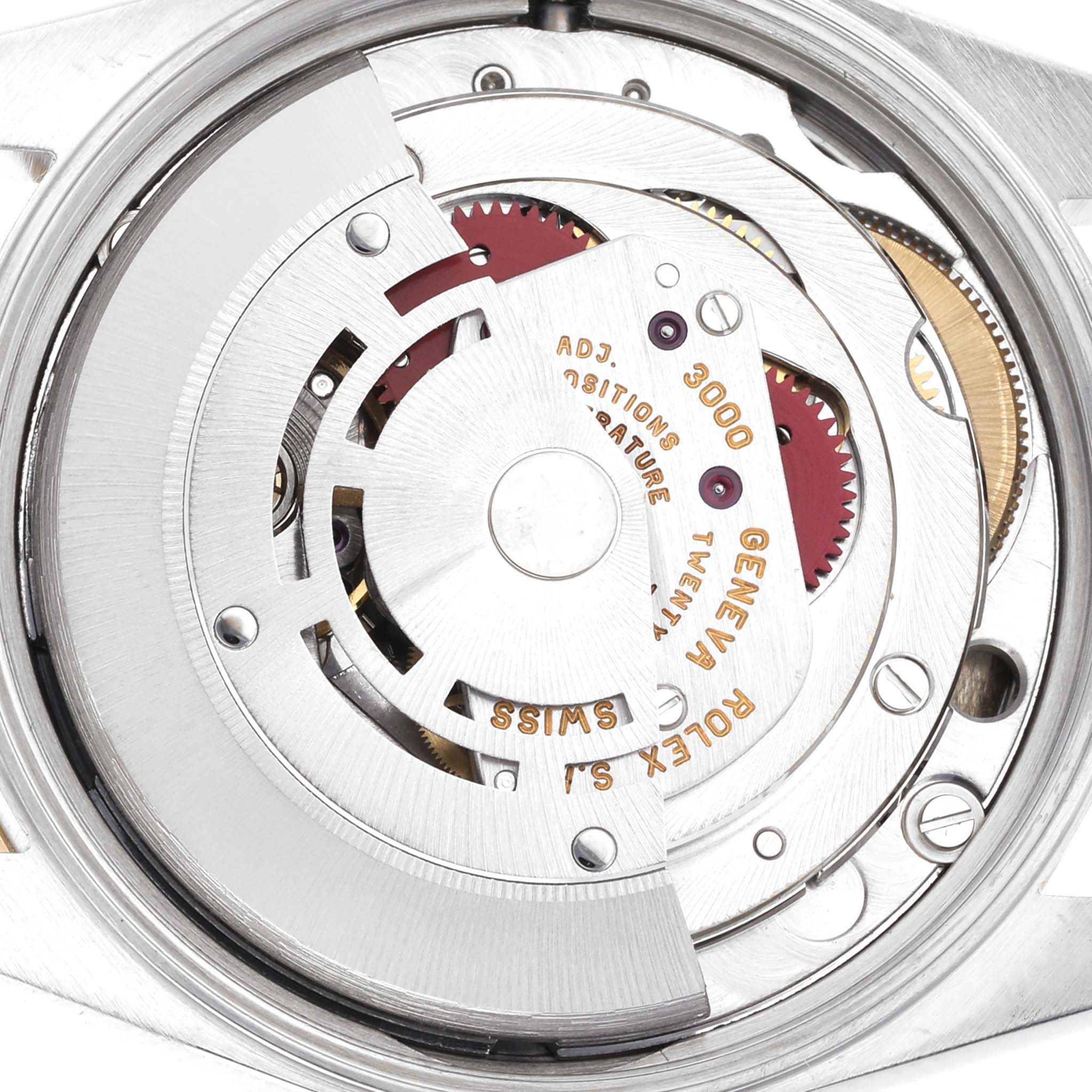 The image shows the internal movement of a Rolex Oyster Perpetual 14203 Men's Steel and Gold (two tone) Black Dial 14203 Men's Steel and Gold (two tone) Black Dial watch from a top-down angle.