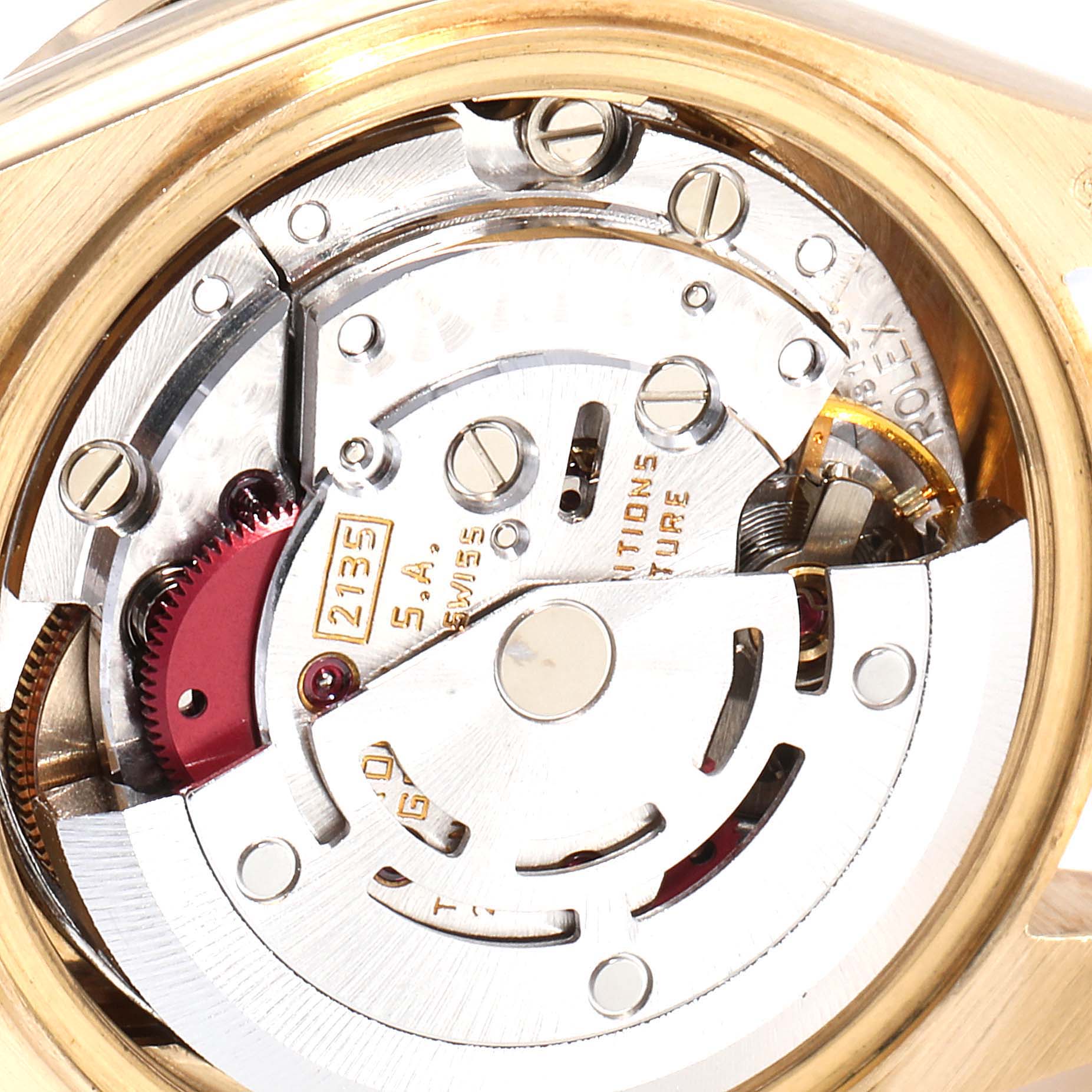 The image shows an internal view of a Rolex President 69288 Women
s Yellow Gold Champagne Dial 69288 Women
s Yellow Gold Champagne Dial model watch, specifically highlighting its mechanical movement components.