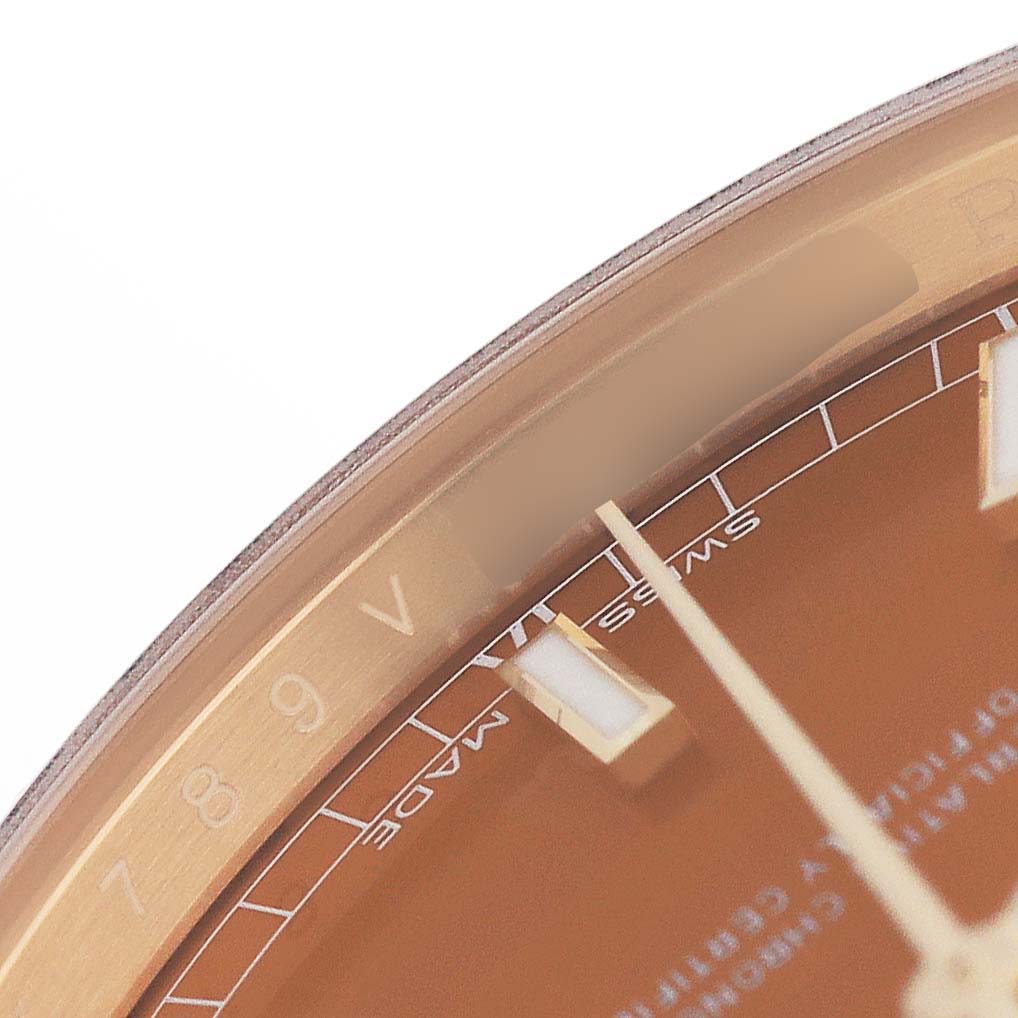 The image shows a close-up of the dial and bezel of a Rolex President 118138 Men's Yellow Gold Orange Dial watch, featuring part of the hour markers and "Swiss Made."