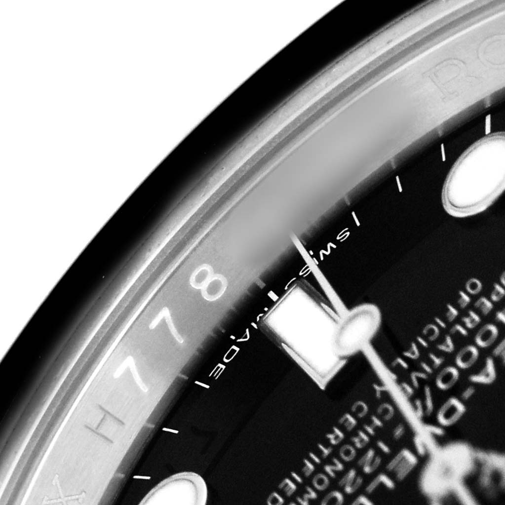 The image shows a close-up of the dial and bezel of a Rolex Sea-Dweller 116600 Men's Stainless Steel Black Dial, highlighting the hour markers and part of the text.