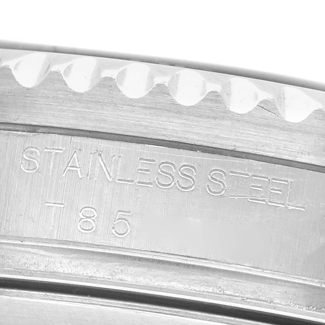 The image shows a close-up of the side of a Rolex Sea-Dweller 16600 Men's Stainless Steel Black Dial watch, highlighting the bezel and engraved stainless steel text.