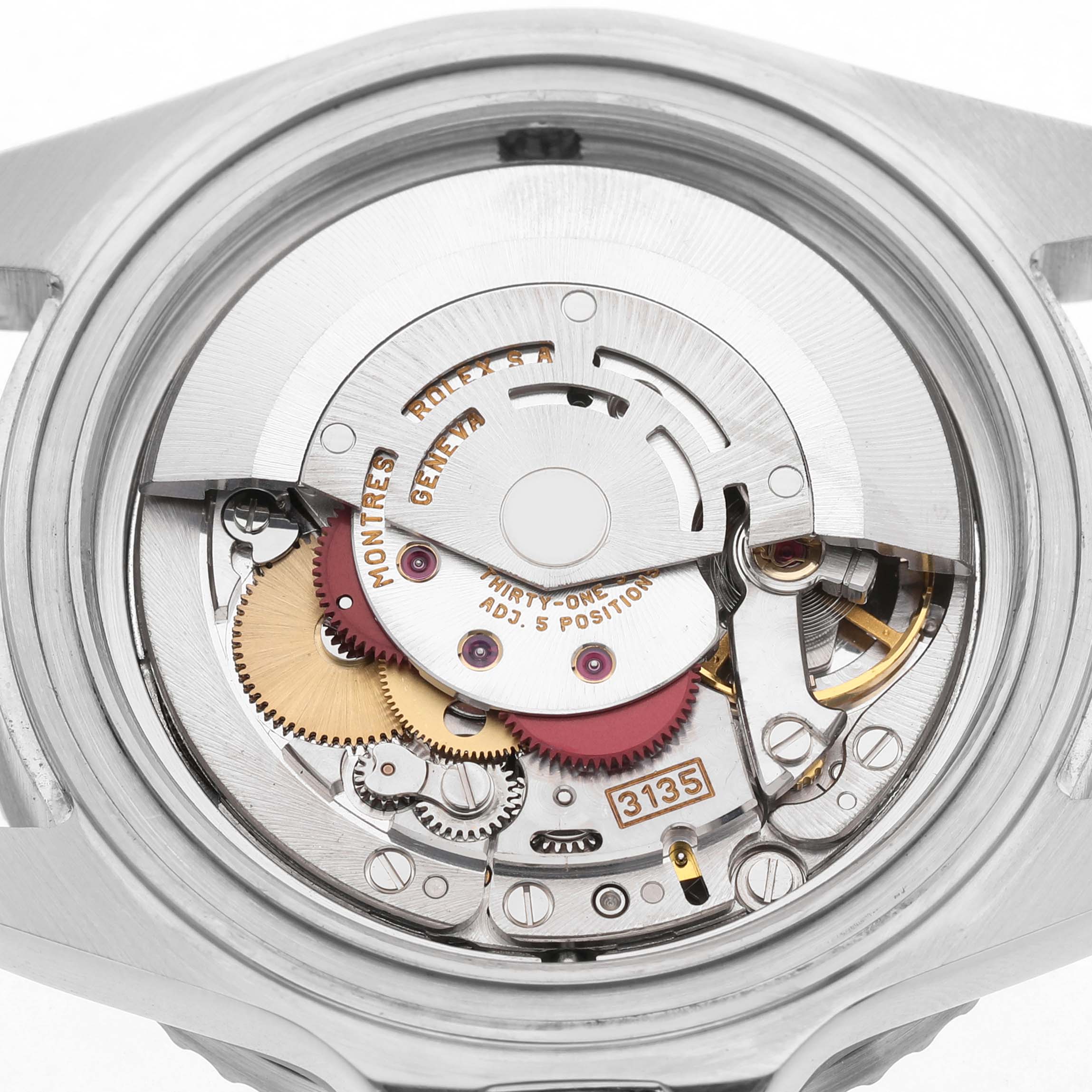 The image shows the open case back of a Rolex Sea-Dweller 16600 Men's Stainless Steel Black Dial, revealing its intricate movement components.