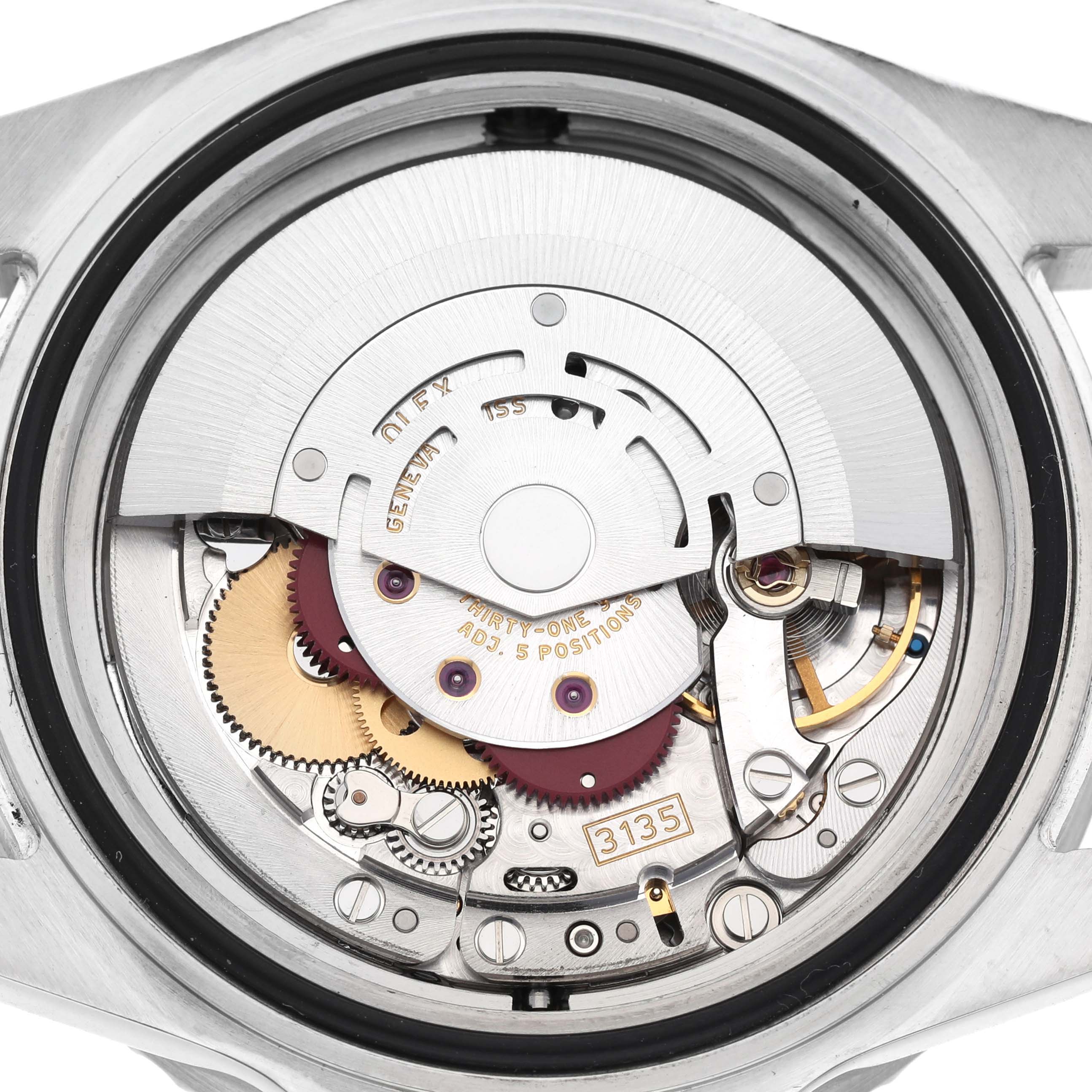 The image shows the back view of a Rolex Sea-Dweller 16600 Men's Stainless Steel Black Dial, revealing its intricate movement mechanisms.
