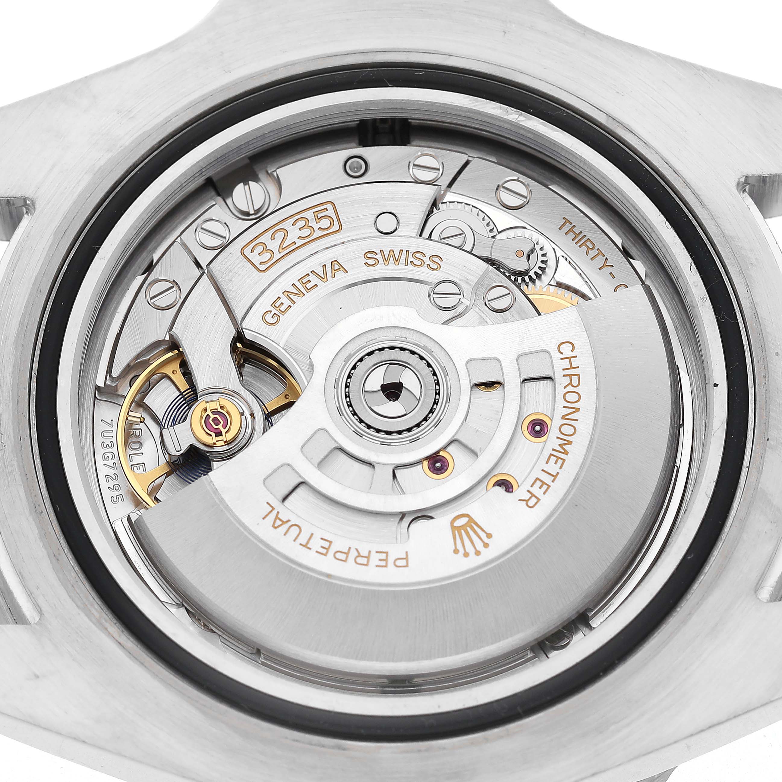 The image shows the open back of a Rolex Sea-Dweller 126600 Men's Stainless Steel Black Dial, focusing on its movement and intricate mechanical details.