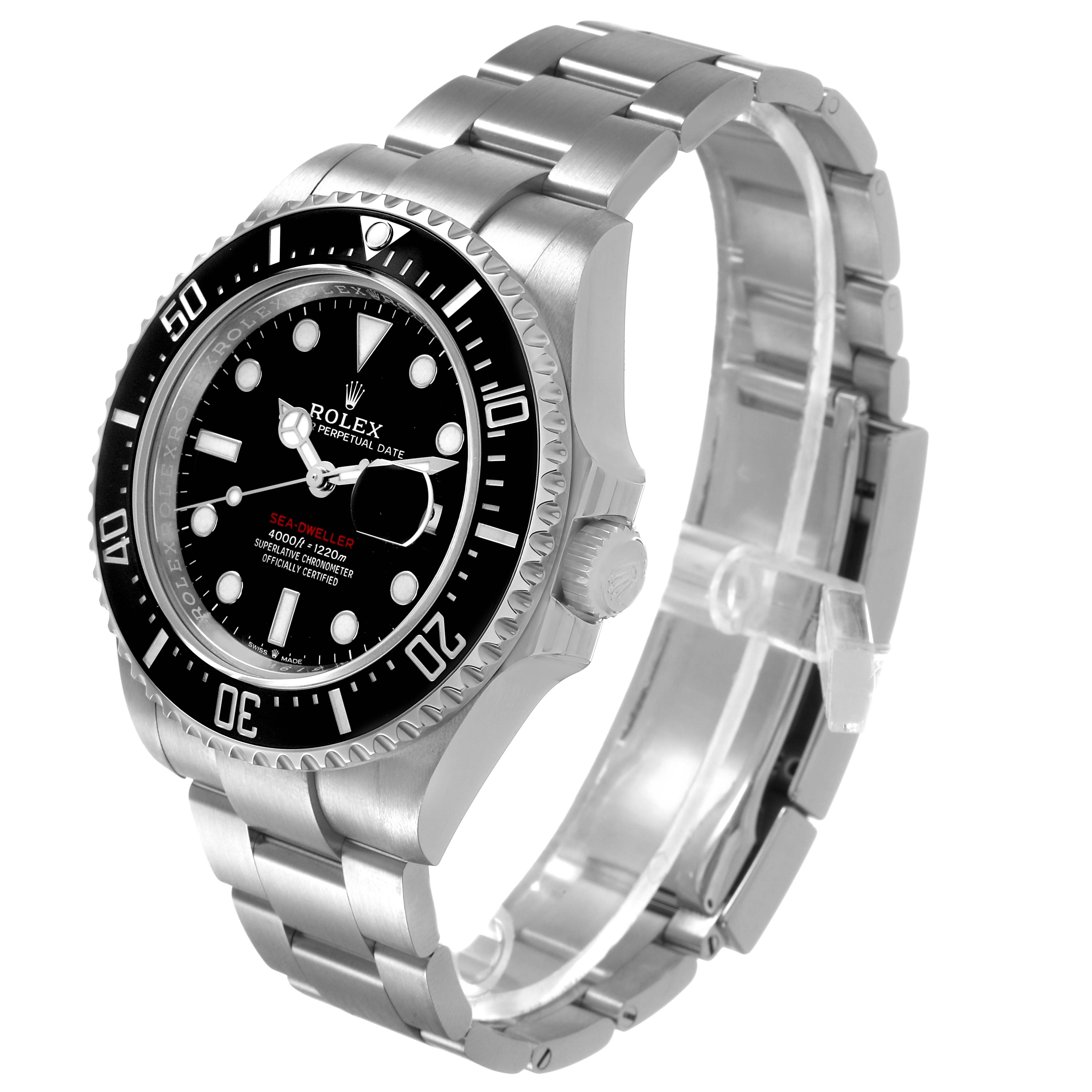 The Rolex Sea-Dweller 126600 Men's Stainless Steel Black Dial watch is shown at a three-quarter angle, highlighting the dial, bezel, crown, and part of the bracelet.
