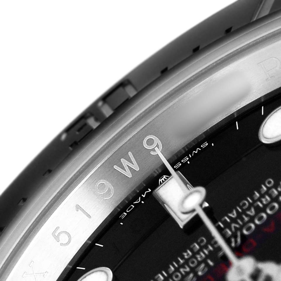 The image shows a close-up of the side profile and partial dial of a Rolex Sea-Dweller 126600 Men's Stainless Steel Black Dial, highlighting the serial engraving and part of the bezel.