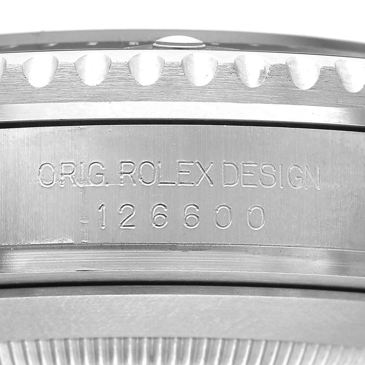 The image shows a close-up of the side engraving on a Rolex Sea-Dweller 126600 Men's Stainless Steel Black Dial, model number 126600.