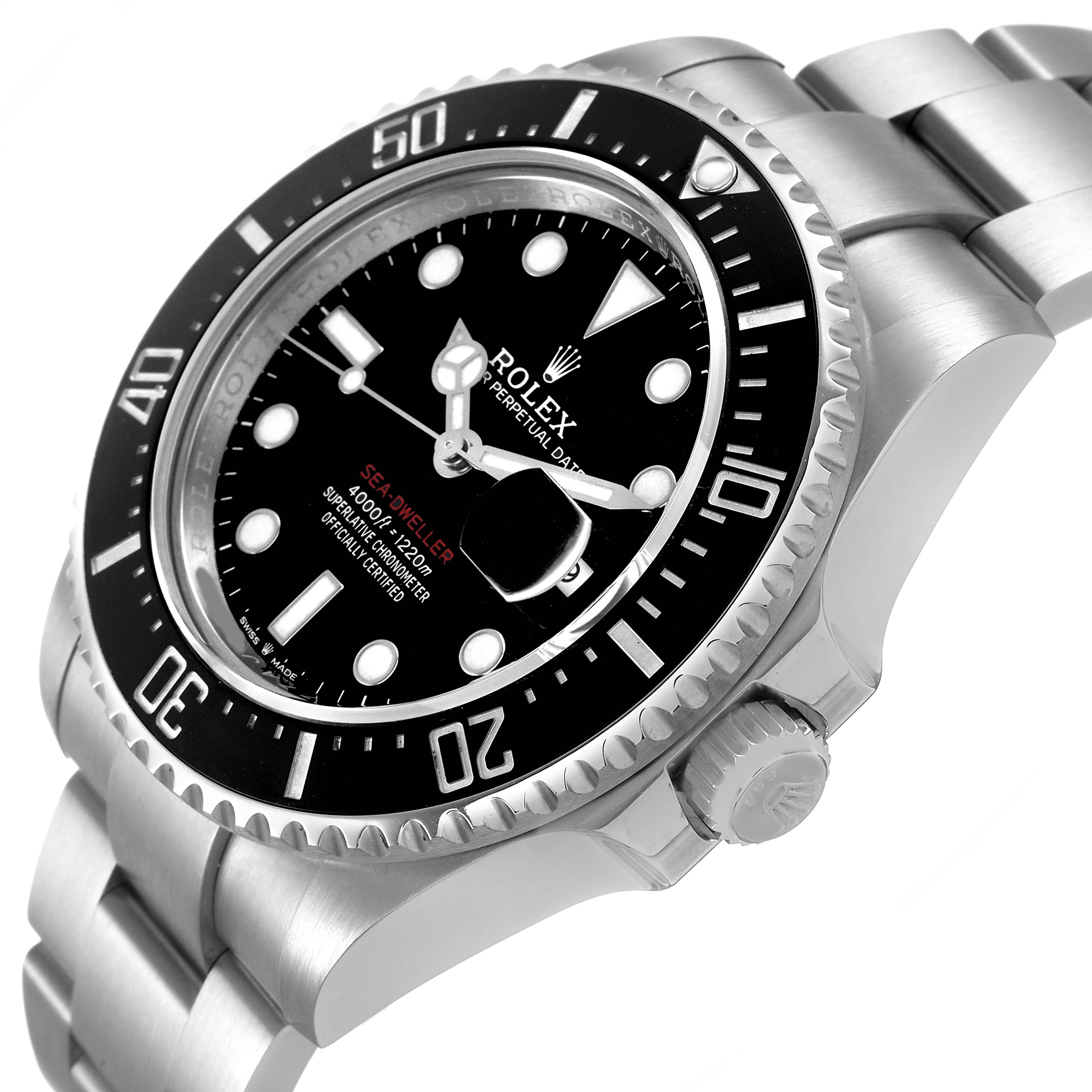 The Rolex Sea-Dweller 126600 Men's Stainless Steel Black Dial watch is shown at a side angle, highlighting the dial, bezel, and partially the bracelet.