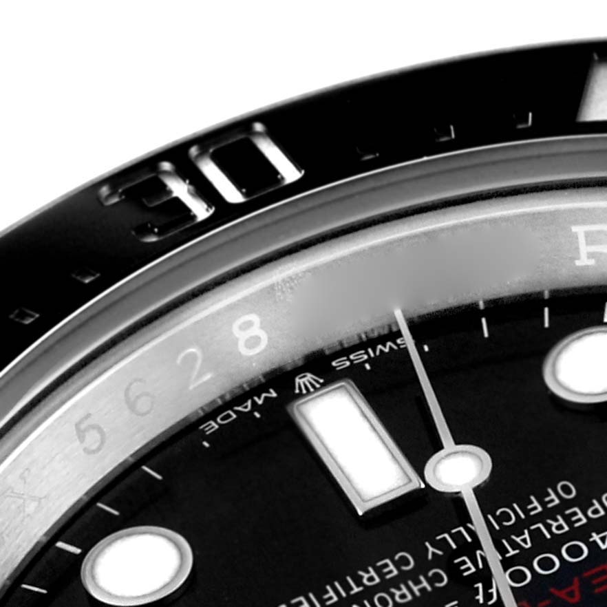 This close-up angle shows the bezel and part of the dial with hour markers of the Rolex Sea-Dweller 126600 Men
s Stainless Steel Black Dial 126600 Men
s Stainless Steel Black Dial watch.