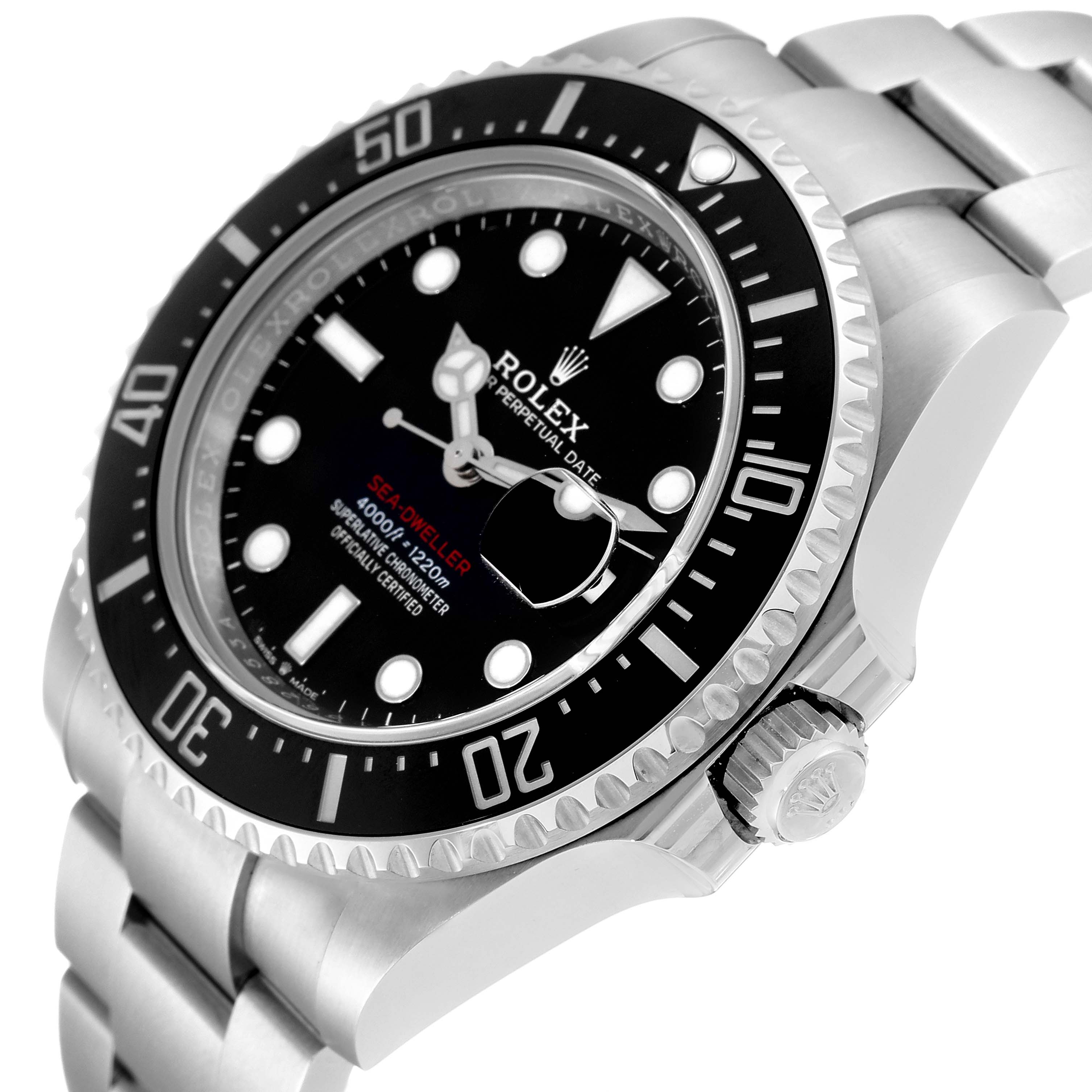 The image shows a side angle of the Rolex Sea-Dweller 126600 Men
s Stainless Steel Black Dial 126600 Men
s Stainless Steel Black Dial watch, highlighting its bezel, dial, hands, and crown.
