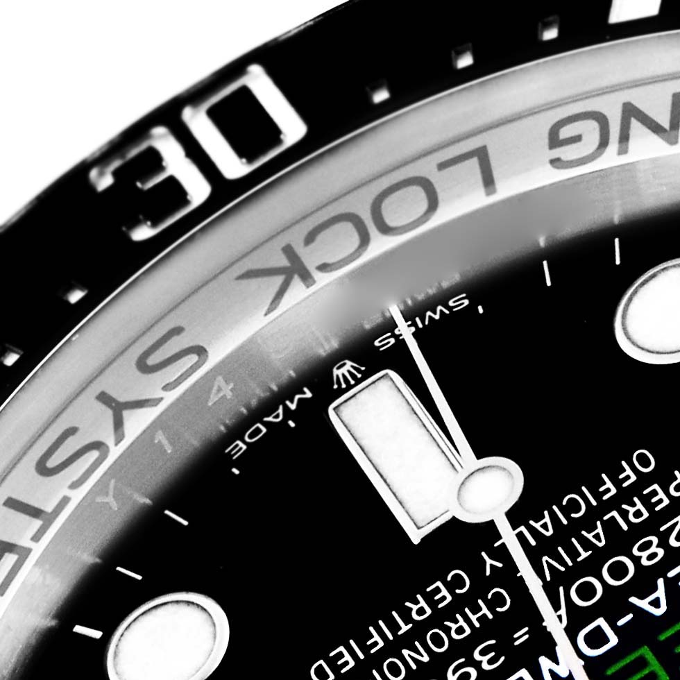 The image shows a close-up of a Rolex Sea-Dweller 126660 Men
s Stainless Steel Blue Dial 126660 Men
s Stainless Steel Blue Dial watch, highlighting part of the bezel and dial.