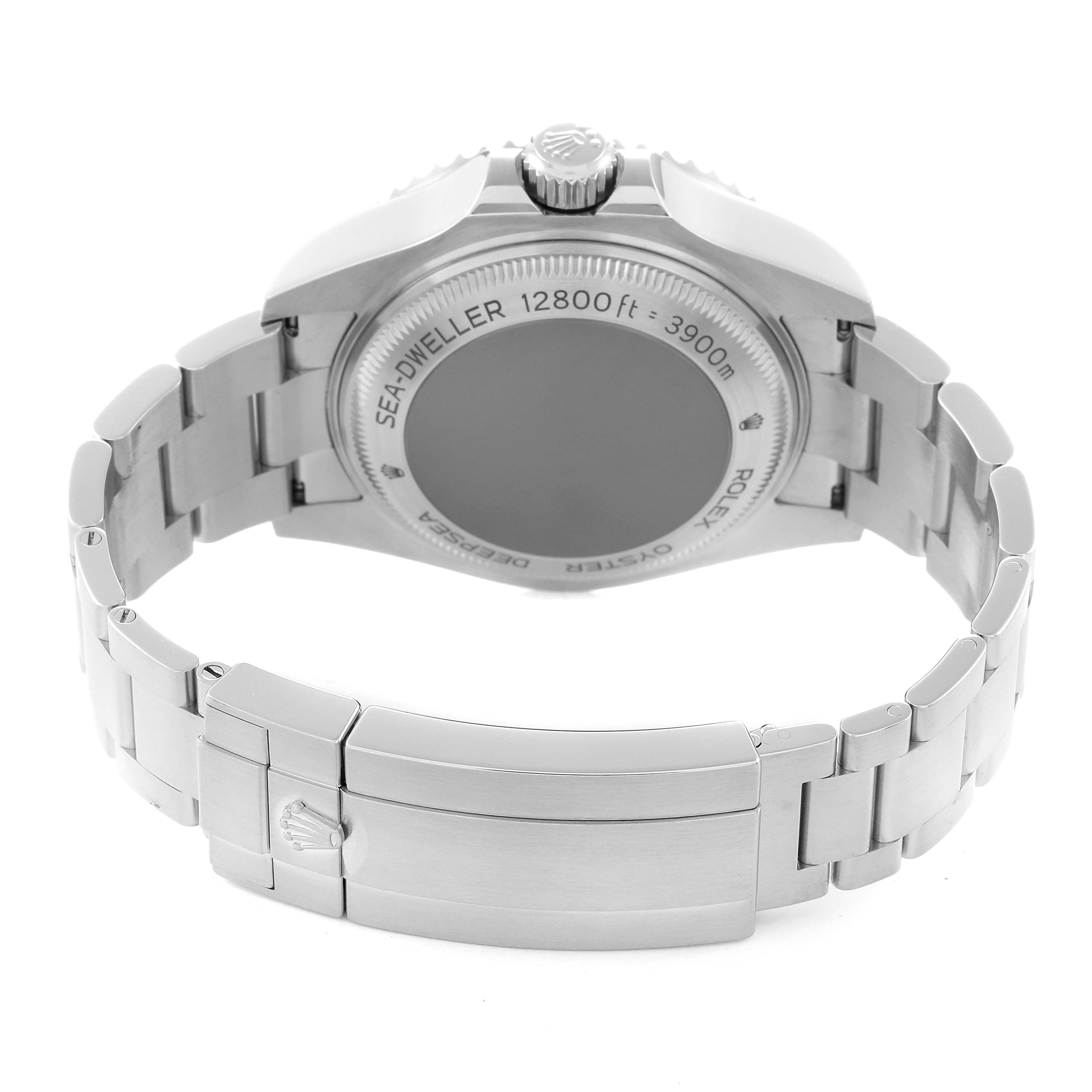 The image shows the Rolex Sea-Dweller 126660 Men
s Stainless Steel Blue Dial 126660 Men
s Stainless Steel Blue Dial watch from the back, highlighting the case back, bracelet, and clasp.