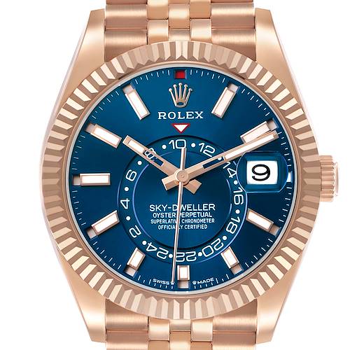 The Rolex Sky-Dweller 336935 Men's Rose Gold Blue Dial watch is shown from the front, highlighting the blue dial, date display, and bezel.